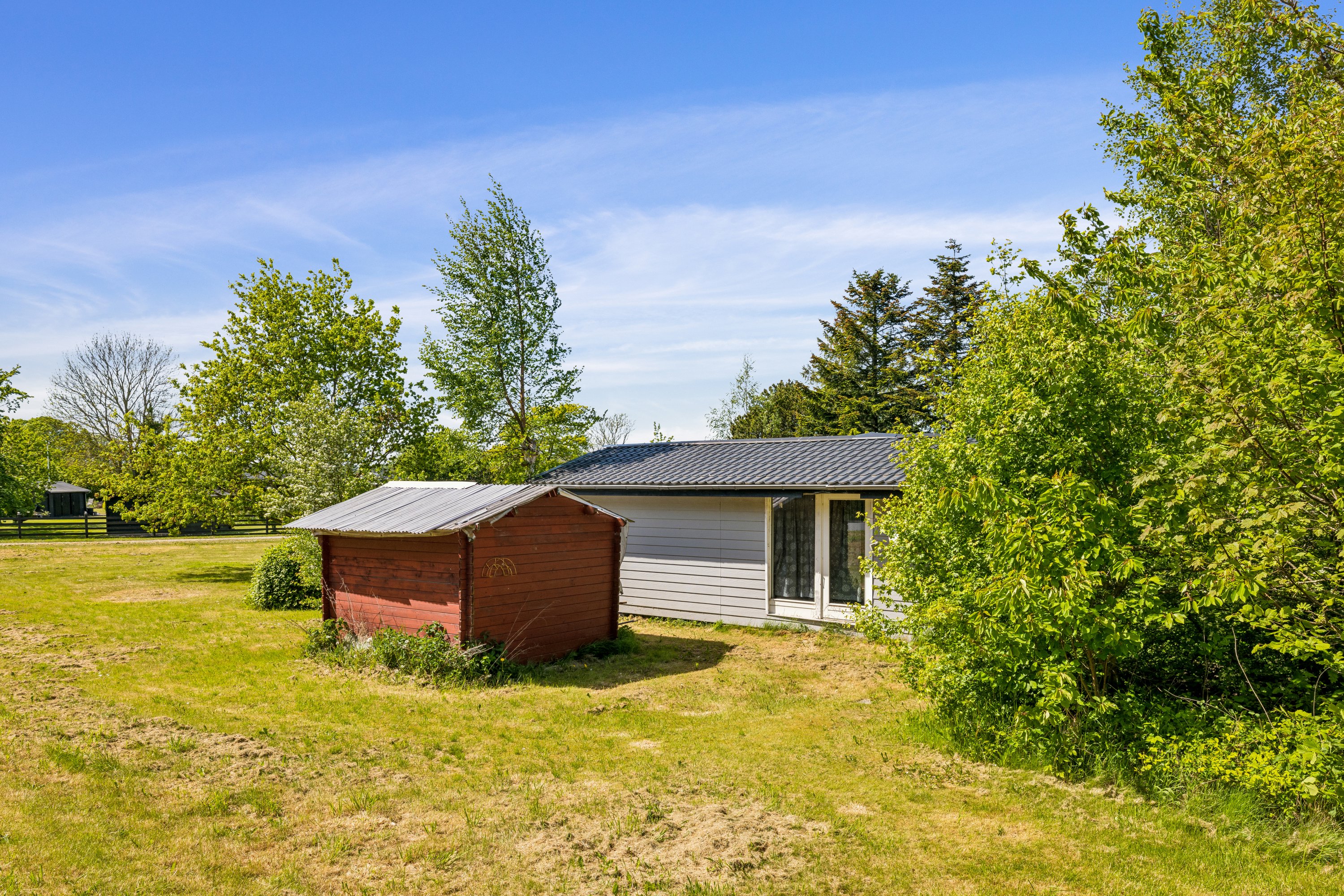 Fremhævet ejendom 1 billede i fuldskærmstilstand. Billede af Strandvejen 6C, Følle Strand, 8410 Rønde