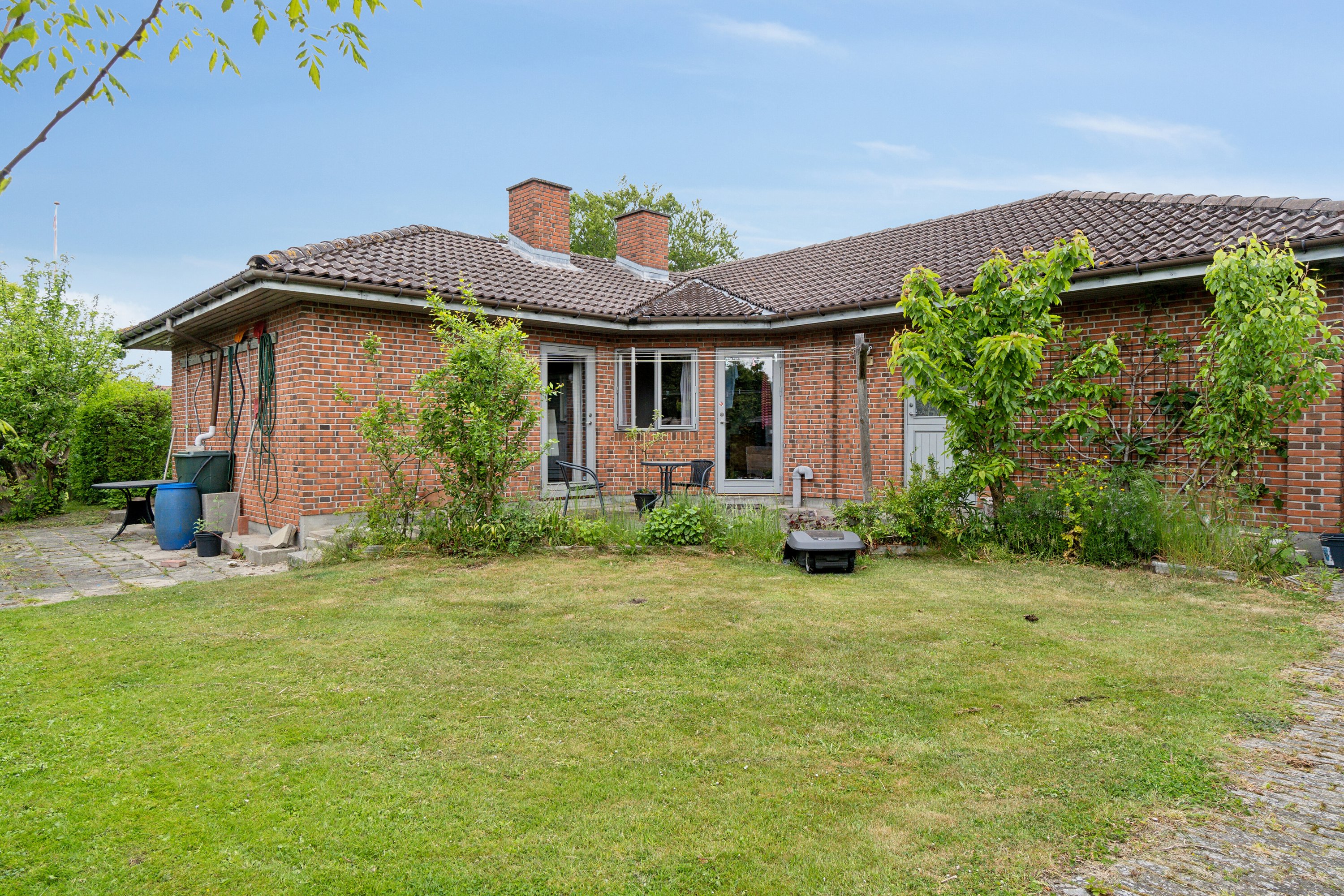 Fremhævet set fra haven billede i fuldskærmstilstand. Billede af Arresødalvej 11C, Vinderød, 3300 Frederiksværk