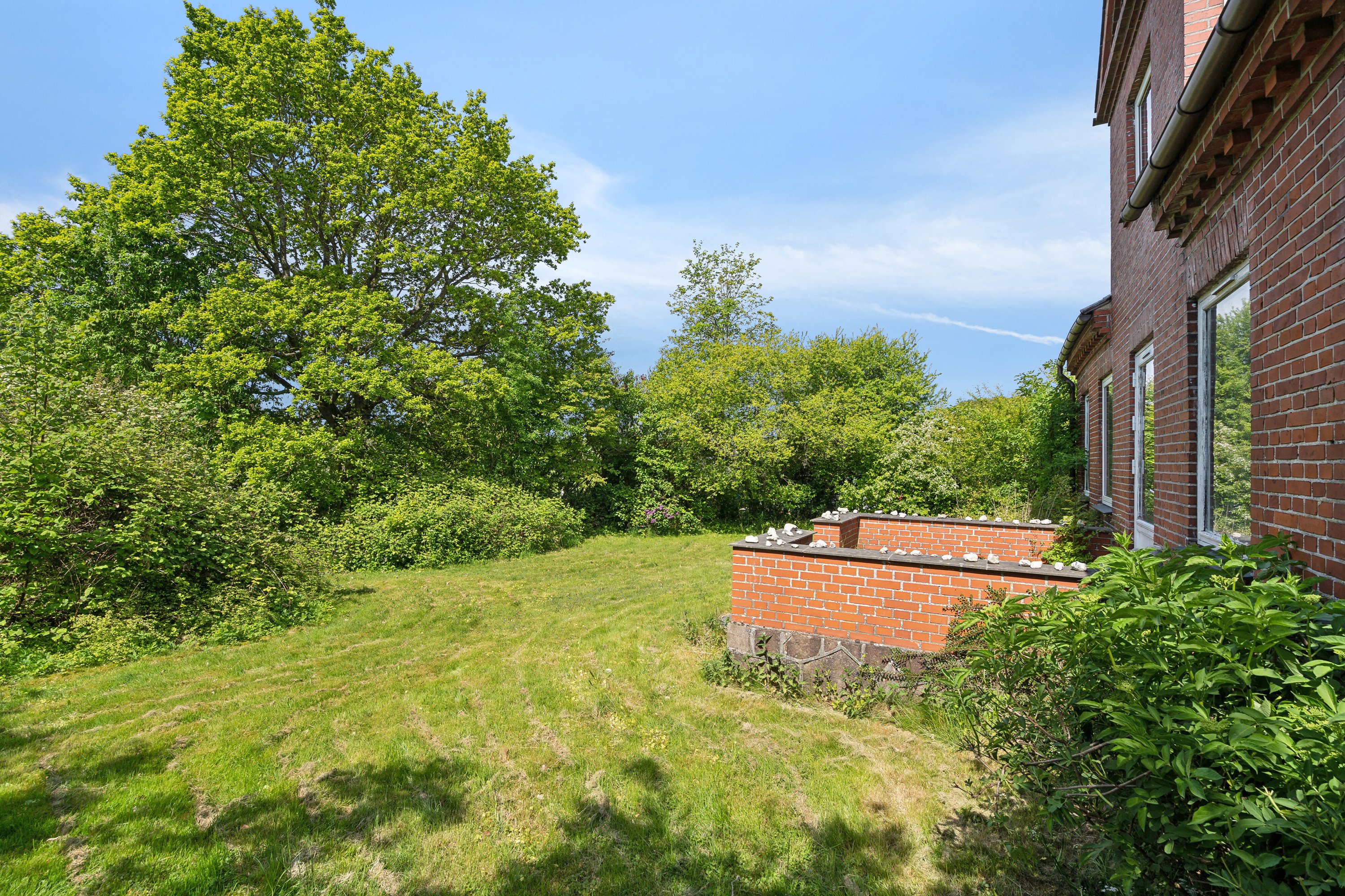 Fremhævet set fra haven billede i fuldskærmstilstand. Billede af Eskebjergvej 16, 5762 Vester Skerninge