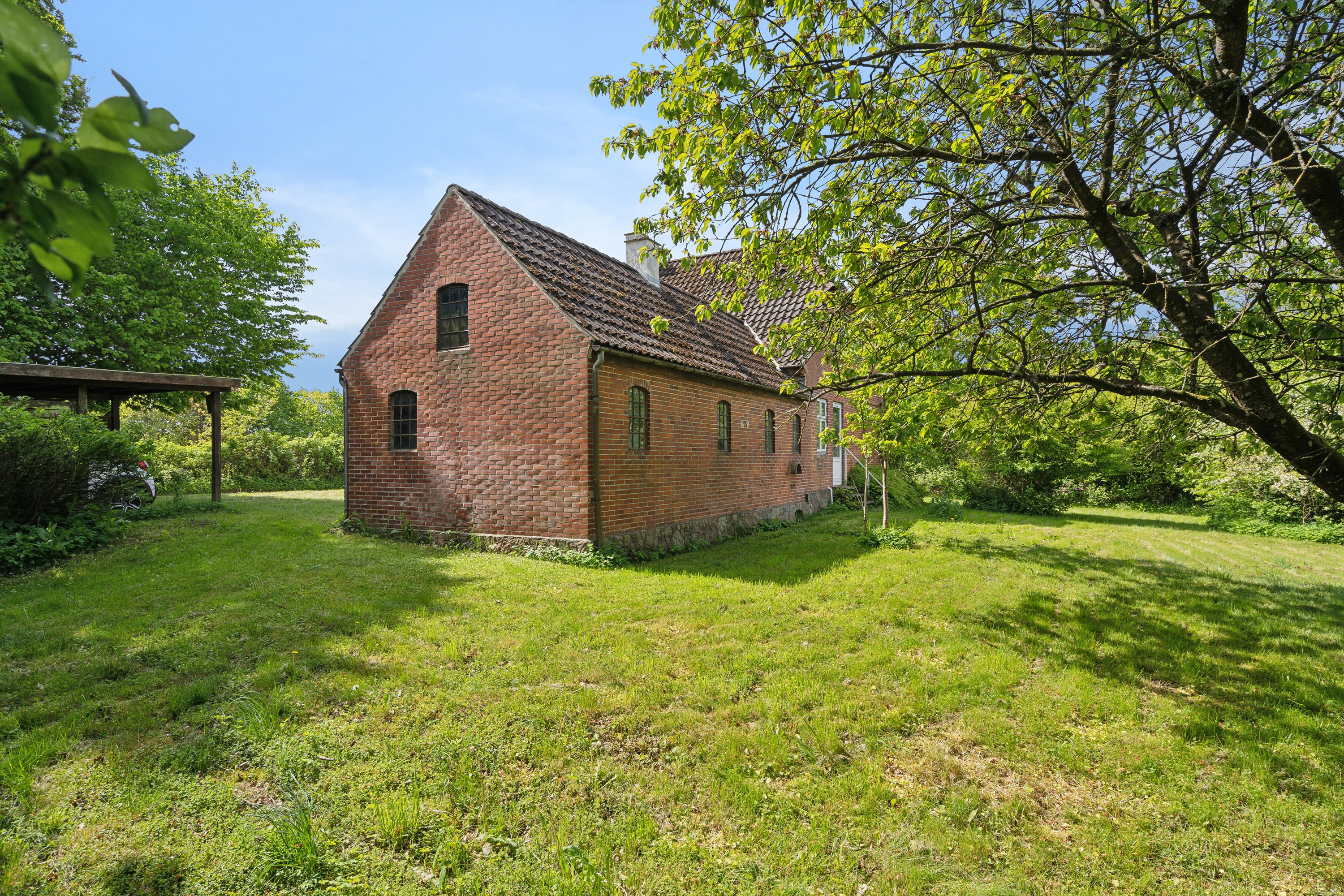 Fremhævet set fra haven billede i fuldskærmstilstand. Billede af Eskebjergvej 16, 5762 Vester Skerninge