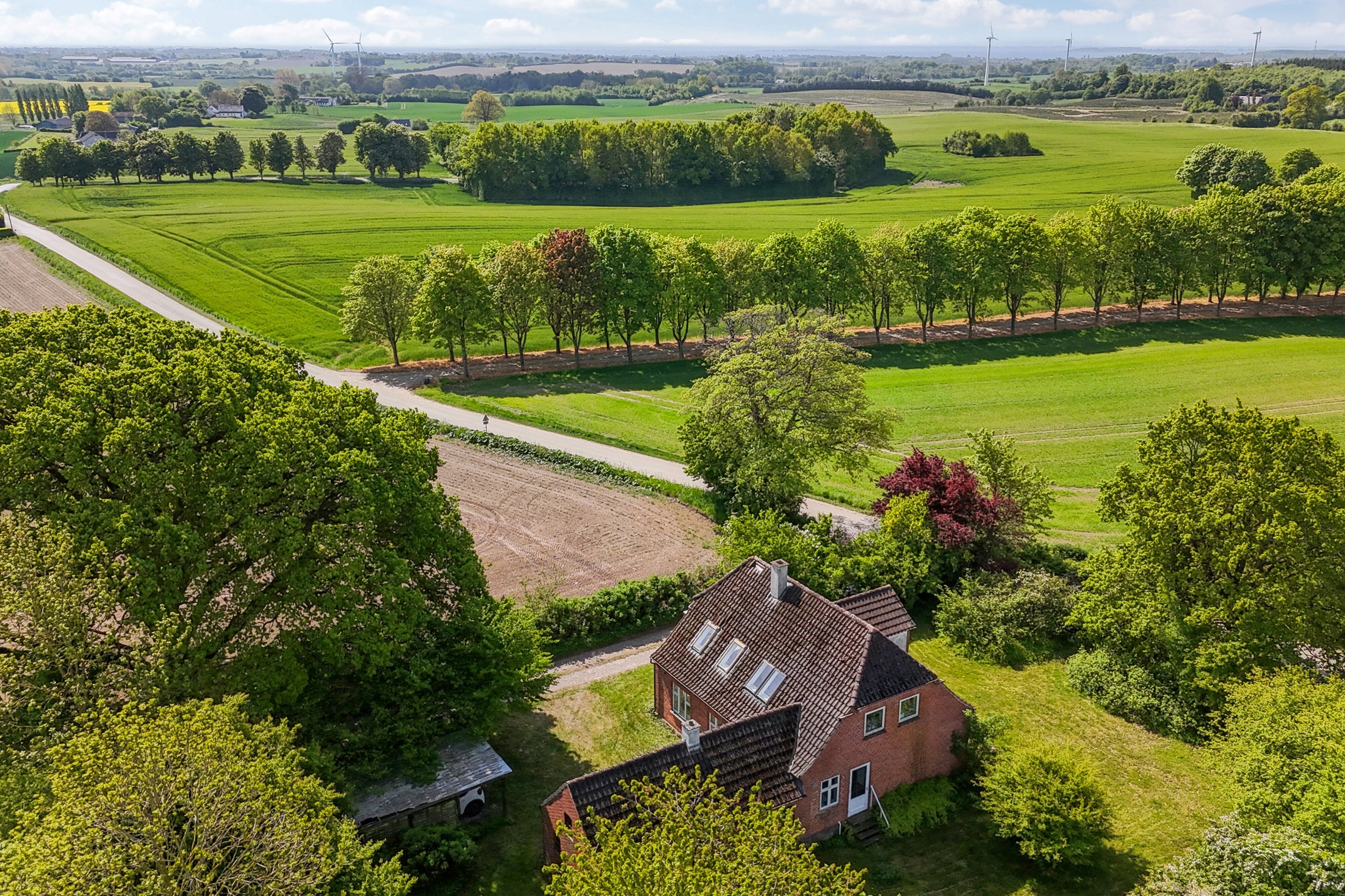 Fremhævet luftfoto billede i fuldskærmstilstand. Billede af Eskebjergvej 16, 5762 Vester Skerninge
