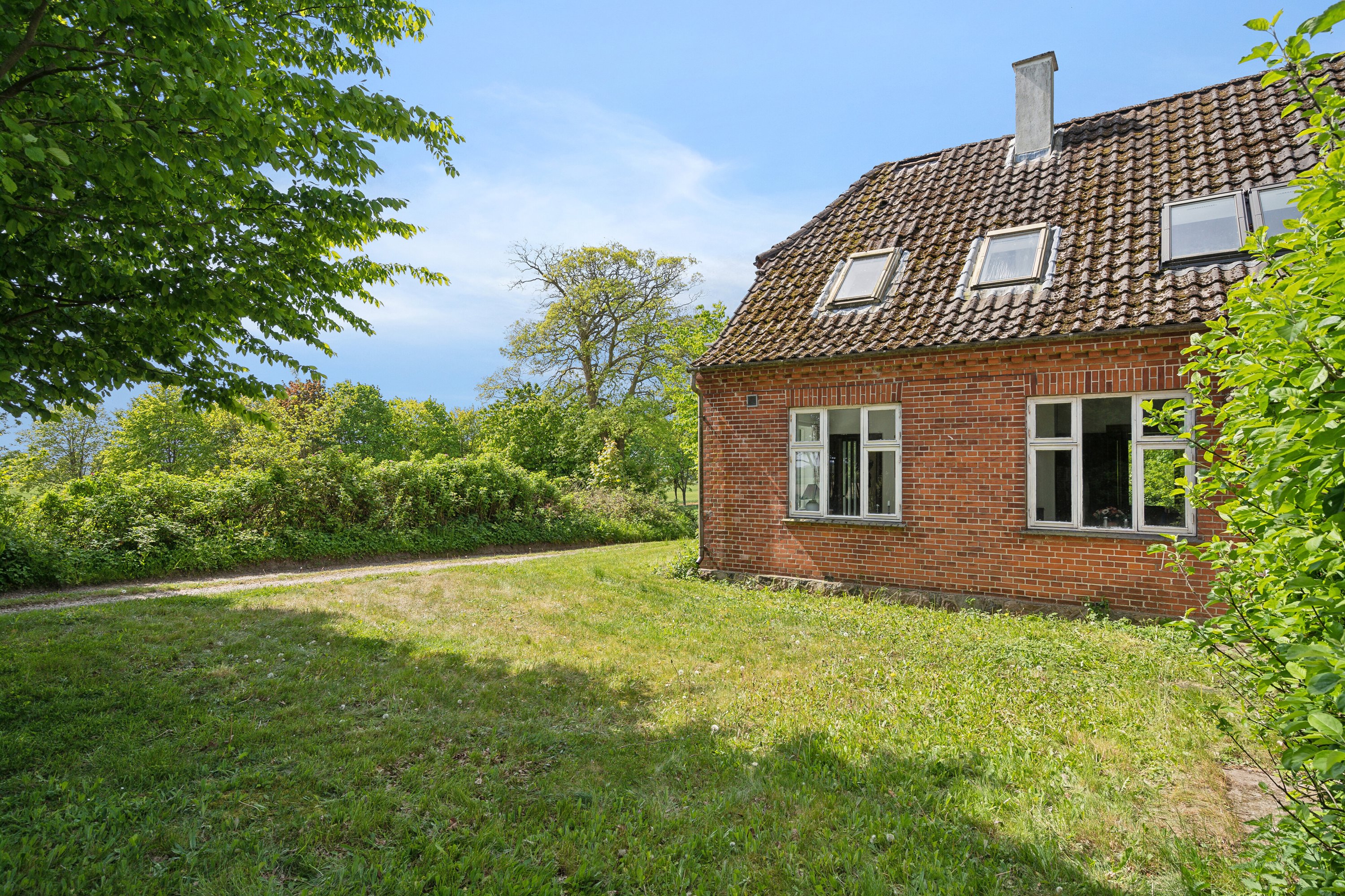 Fremhævet set fra haven billede i fuldskærmstilstand. Billede af Eskebjergvej 16, 5762 Vester Skerninge