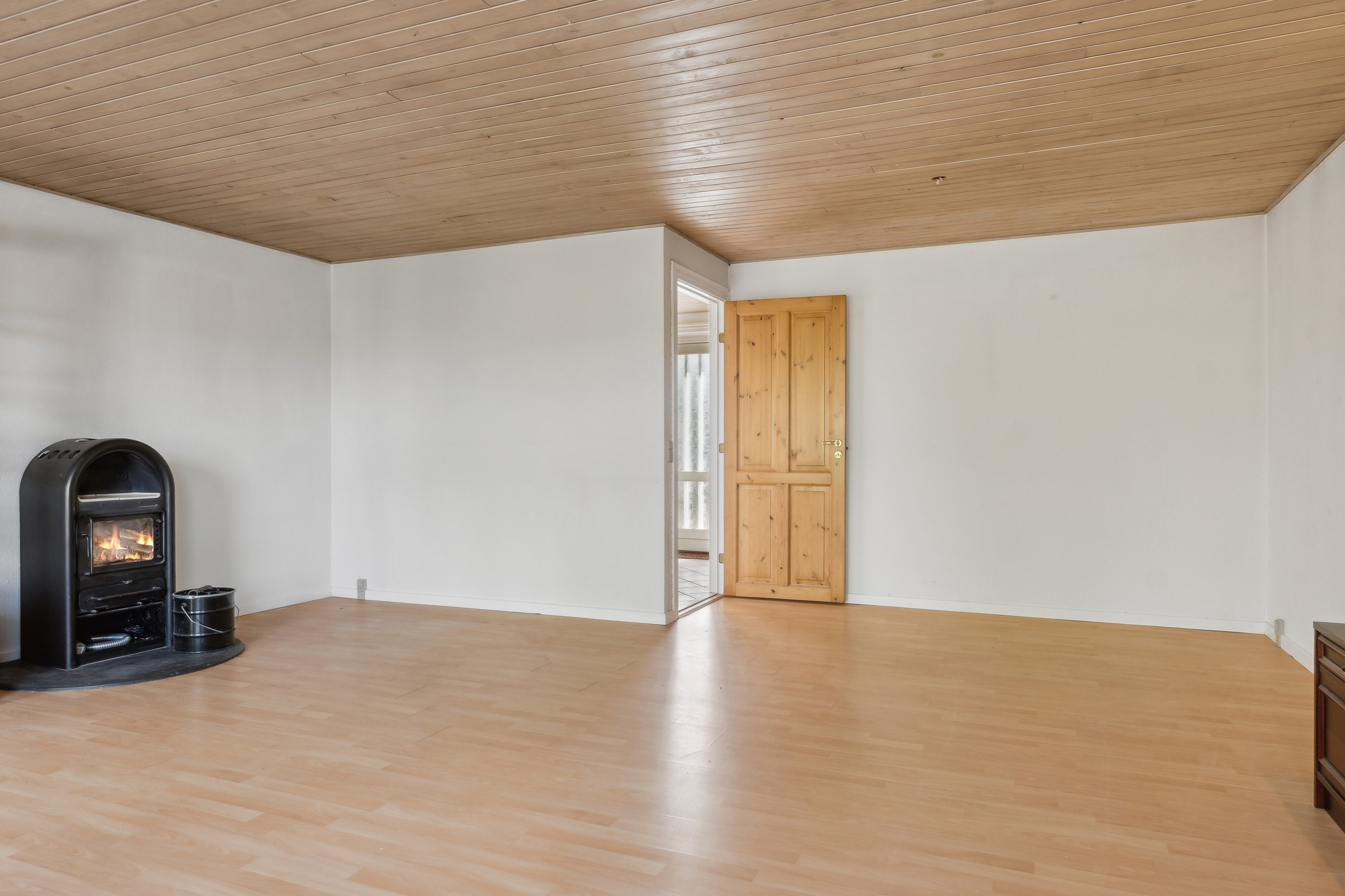 Fremhævet stue billede i fuldskærmstilstand. Billede af Falkevej 10B, Lendum, 9870 Sindal