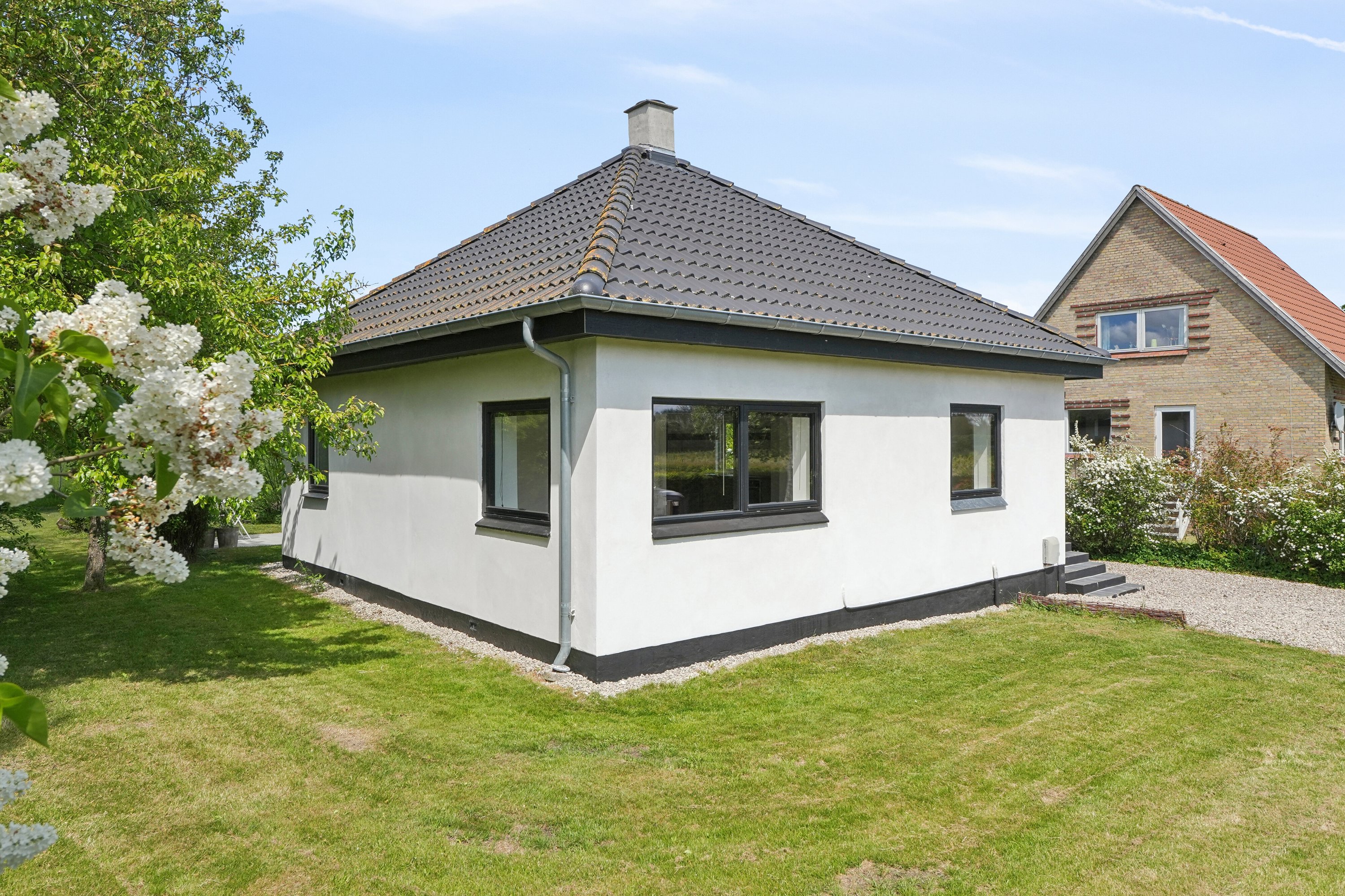 Fremhævet set fra haven billede i fuldskærmstilstand. Billede af Nyvej 22, Ulbølle, 5762 Vester Skerninge