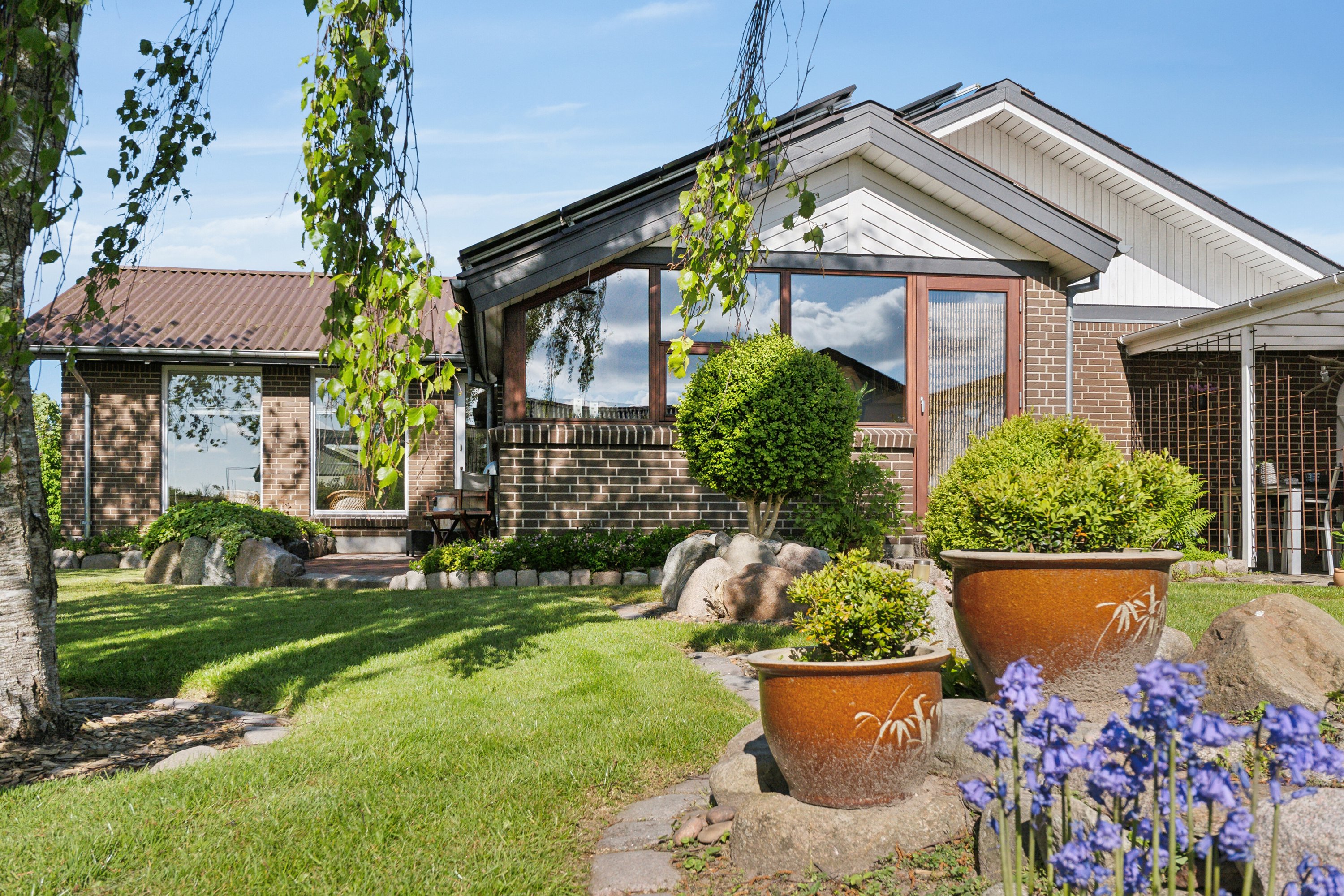 Fremhævet set fra haven billede i fuldskærmstilstand. Billede af Friggsvej 25, 9870 Sindal