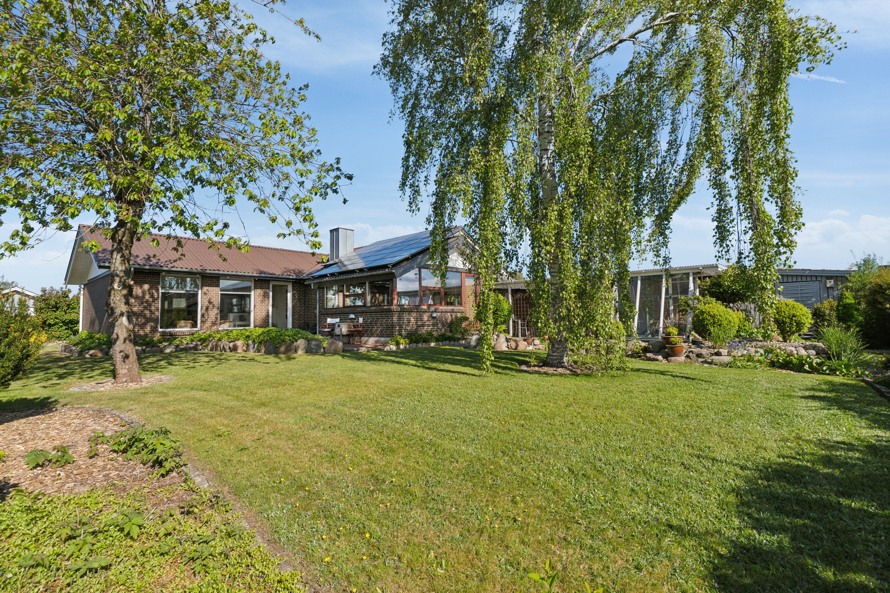 Fremhævet set fra haven billede i fuldskærmstilstand. Billede af Friggsvej 25, 9870 Sindal