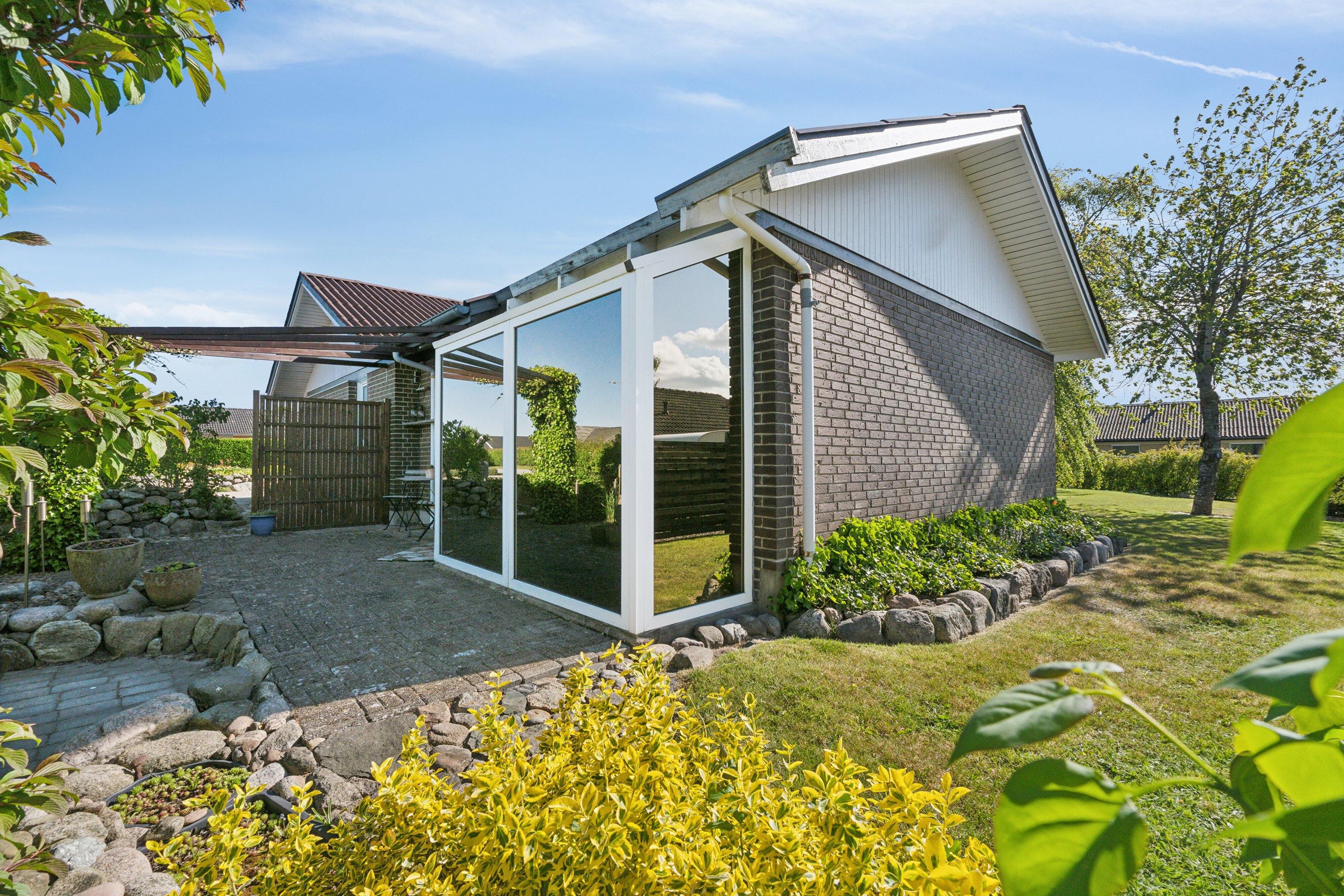 Fremhævet set fra haven billede i fuldskærmstilstand. Billede af Friggsvej 25, 9870 Sindal