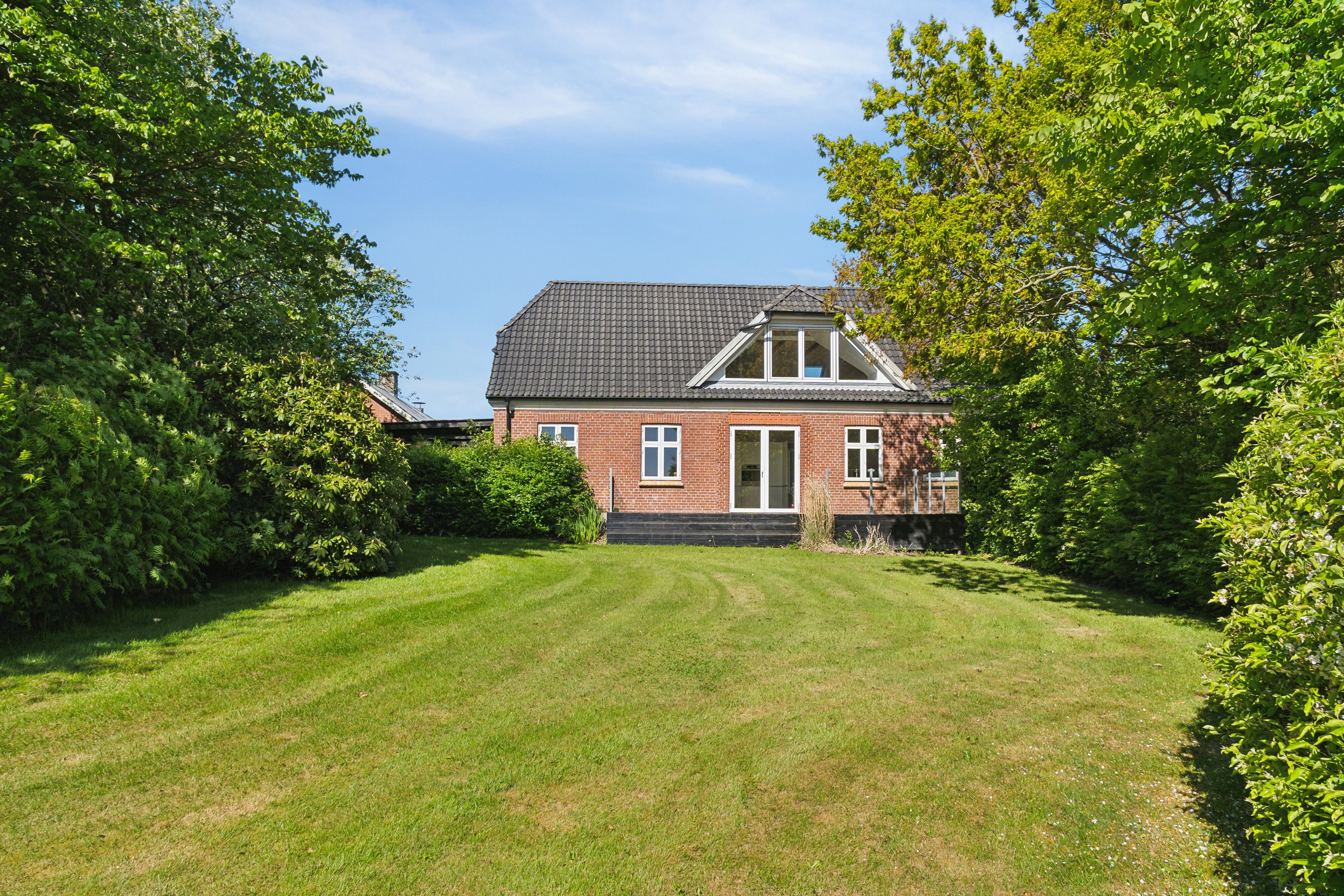 Fremhævet set fra haven billede i fuldskærmstilstand. Billede af Åsvej 4, Silstrup, 7700 Thisted