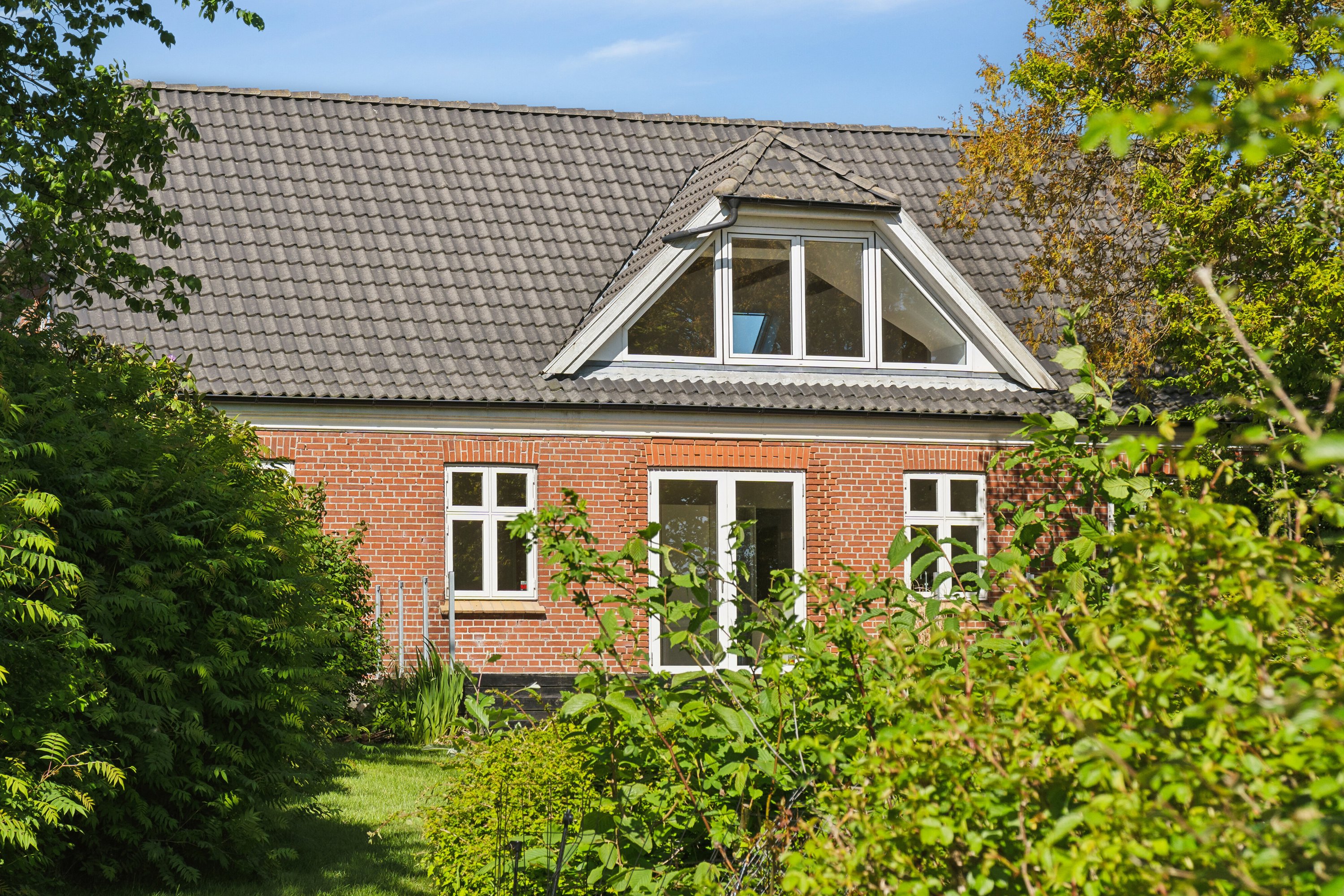 Fremhævet set fra haven billede i fuldskærmstilstand. Billede af Åsvej 4, Silstrup, 7700 Thisted