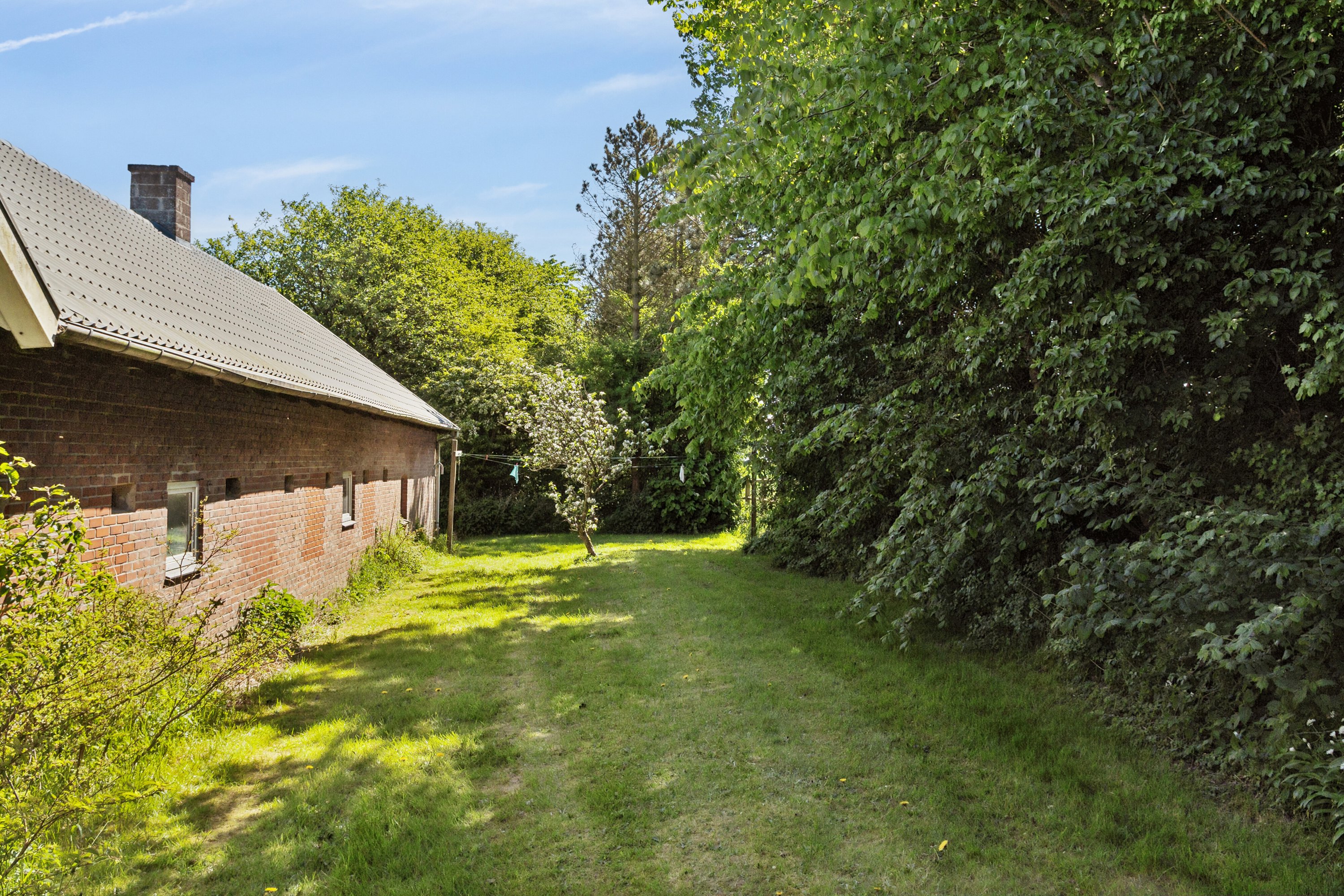 Fremhævet set fra haven billede i fuldskærmstilstand. Billede af Åsvej 4, Silstrup, 7700 Thisted