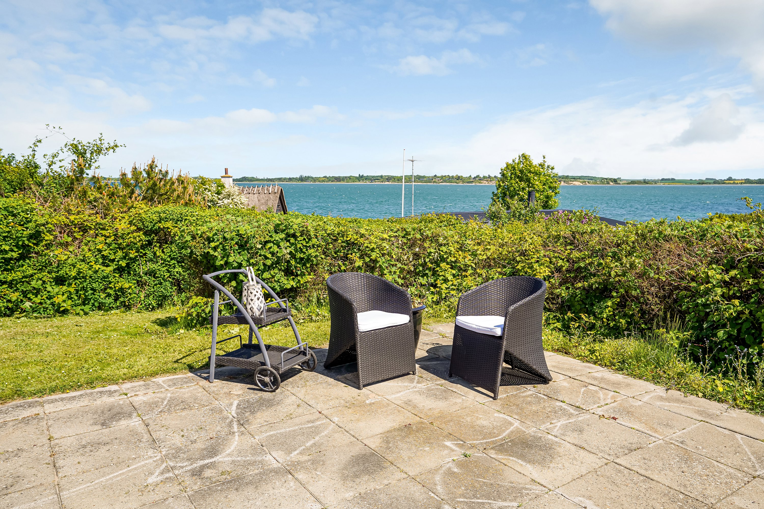 Fremhævet terrasse billede i fuldskærmstilstand. Billede af Madehøjvej 4, Midskov, 5370 Mesinge