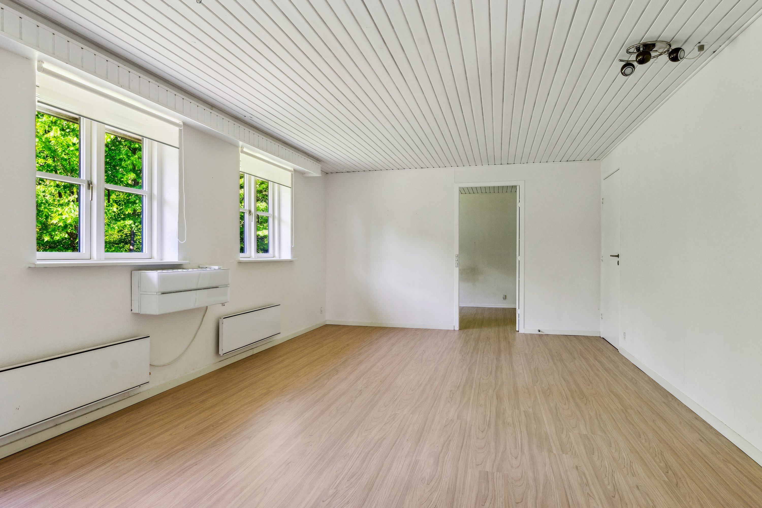 Fremhævet stue billede i fuldskærmstilstand. Billede af Sofienlundparken 12A, 8860 Ulstrup