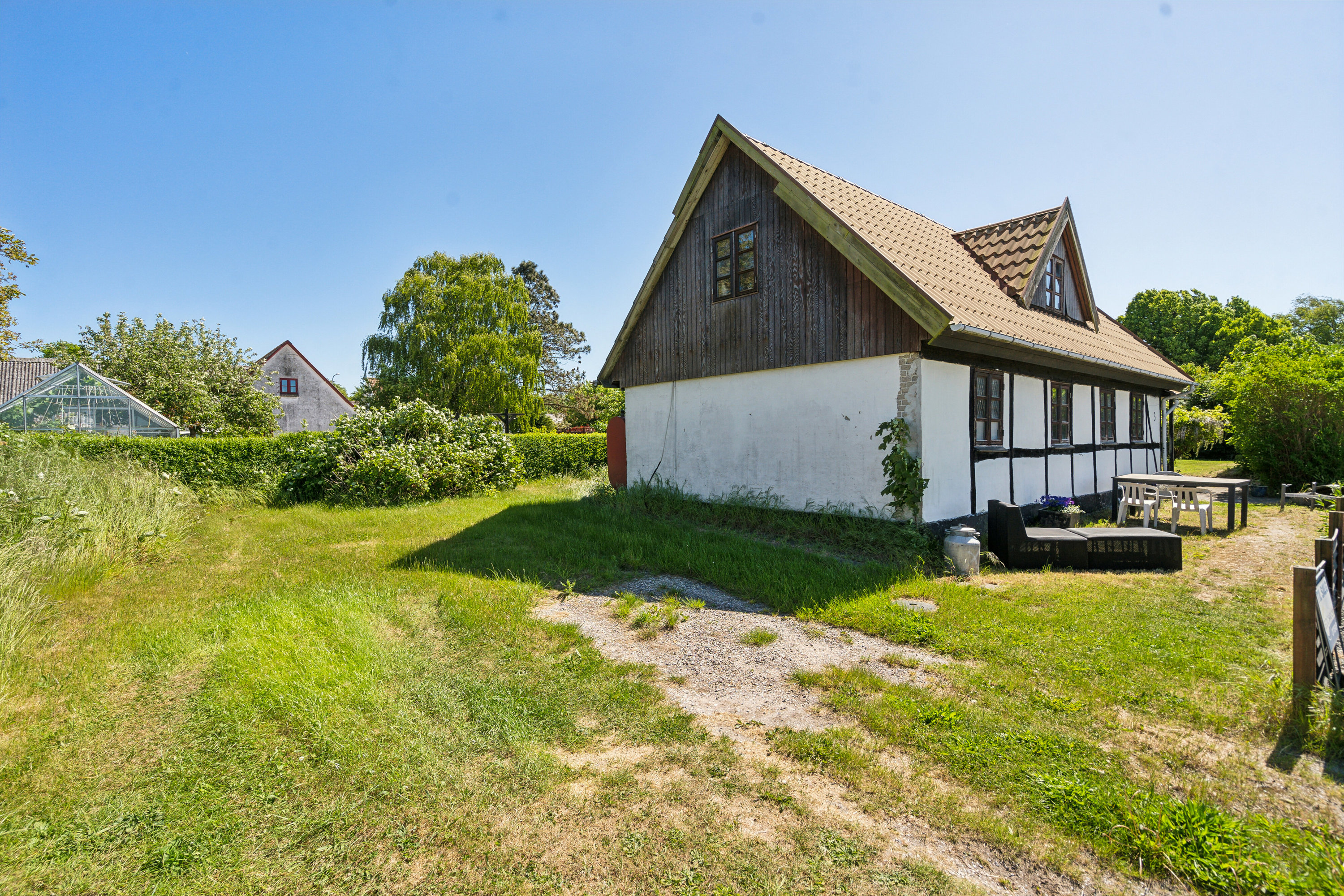Fremhævet set fra haven billede i fuldskærmstilstand. Billede af Grønnegade 3, Tørresø, 5450 Otterup