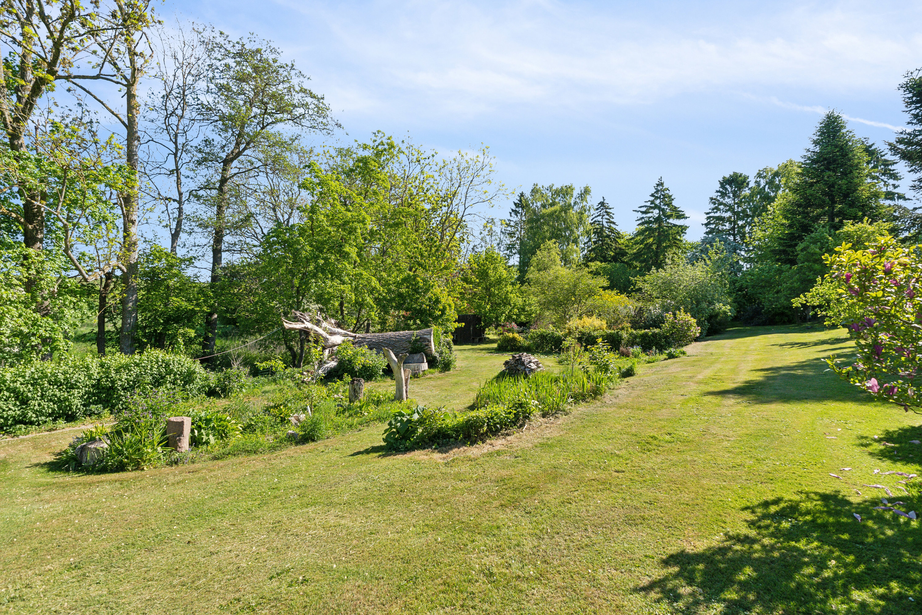 Fremhævet set fra haven billede i fuldskærmstilstand. Billede af Kirkevej 14, 5892 Gudbjerg Sydfyn