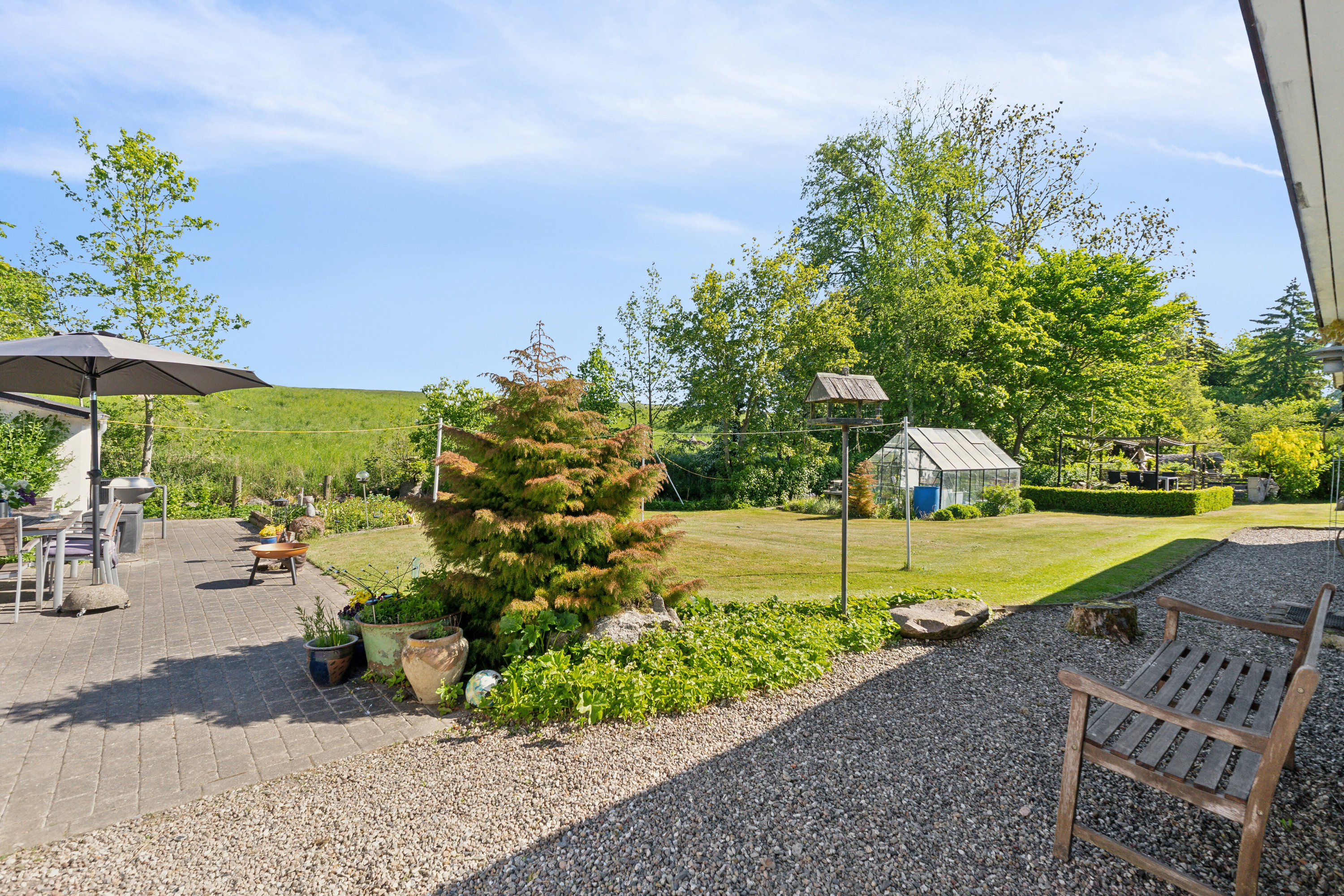 Fremhævet udendørs billede i fuldskærmstilstand. Billede af Kirkevej 14, 5892 Gudbjerg Sydfyn