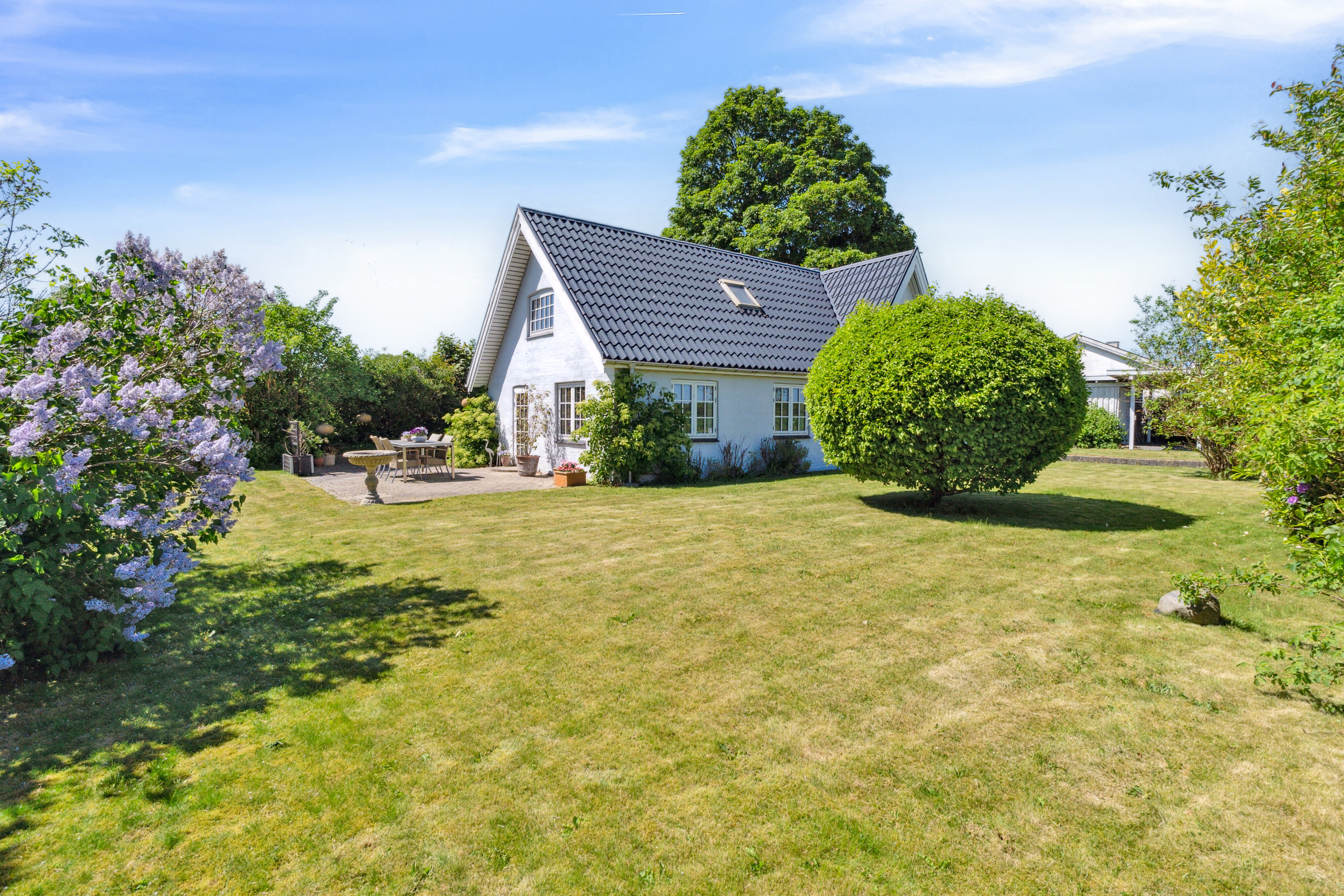 Fremhævet set fra haven billede i fuldskærmstilstand. Billede af Farrevej 31, Skjørring, 8464 Galten