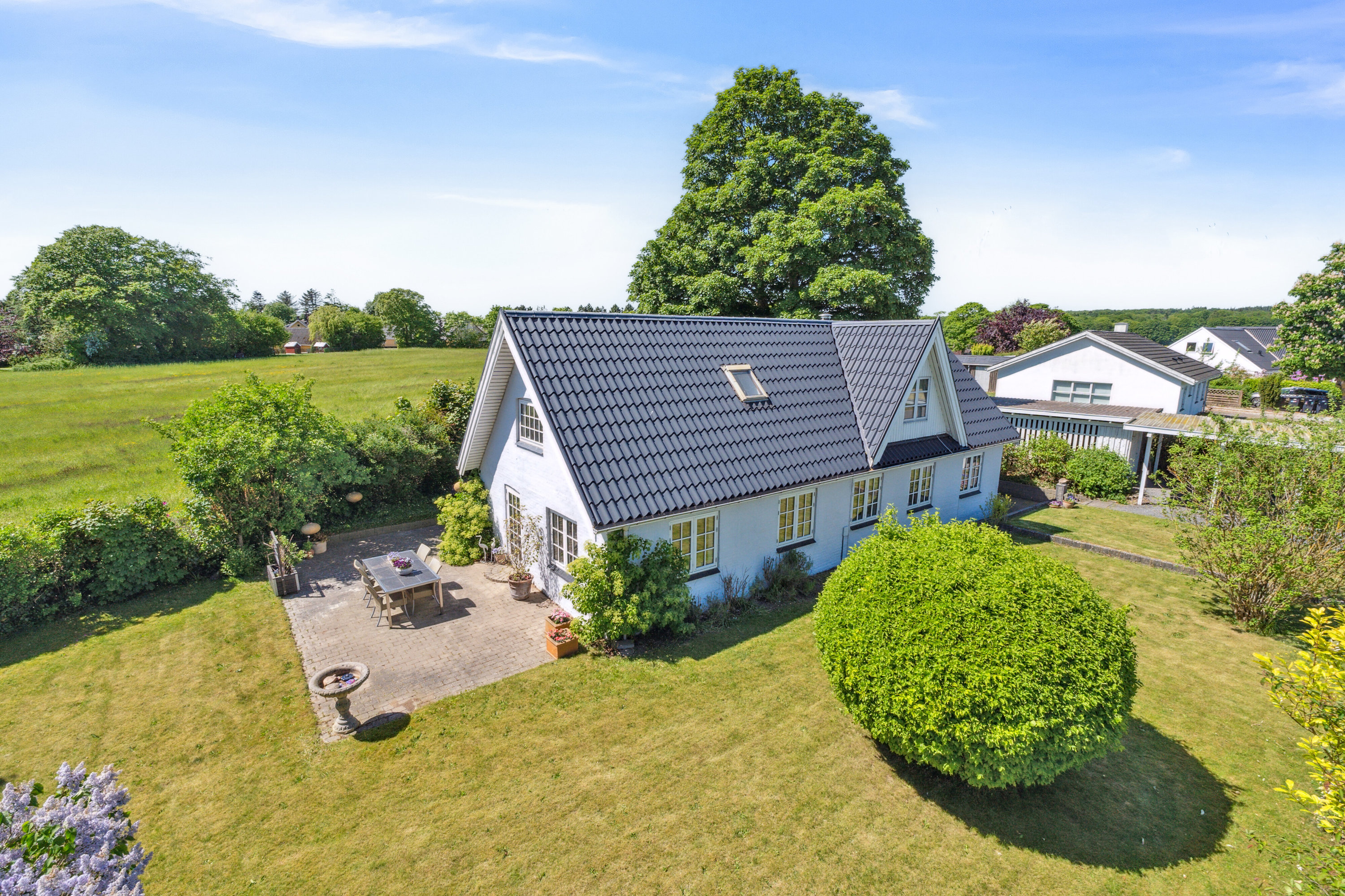 Fremhævet set fra haven billede i fuldskærmstilstand. Billede af Farrevej 31, Skjørring, 8464 Galten