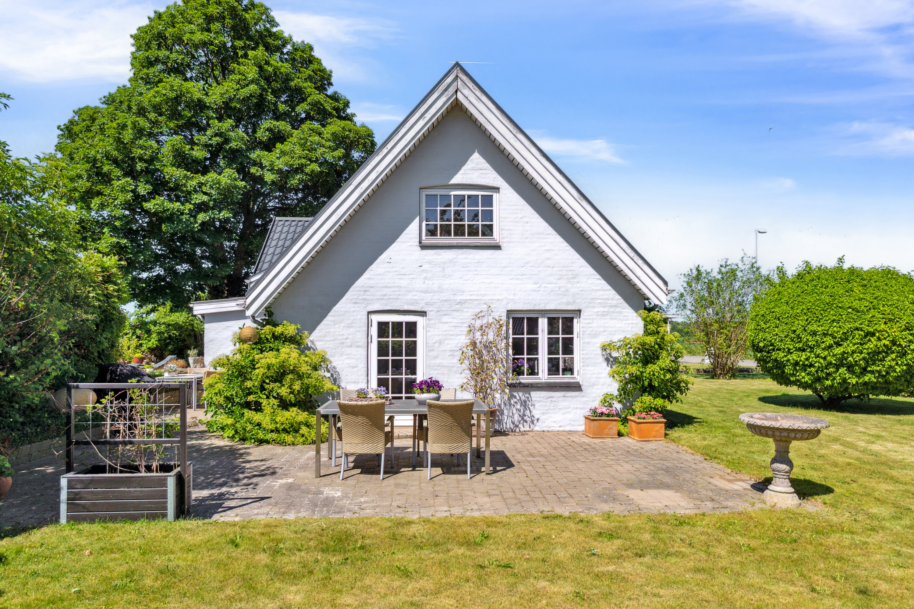 Fremhævet set fra haven billede i fuldskærmstilstand. Billede af Farrevej 31, Skjørring, 8464 Galten