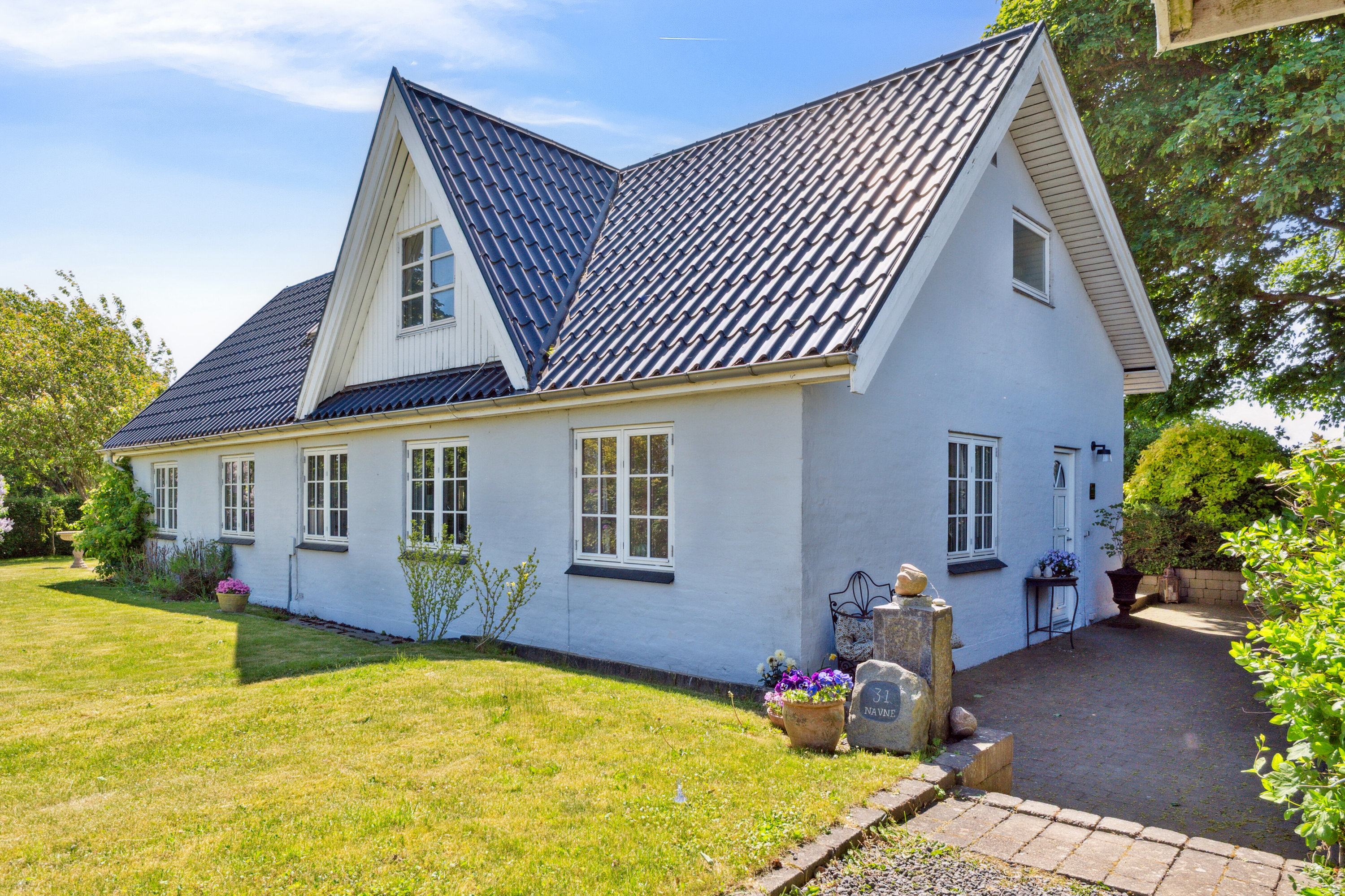 Fremhævet set fra haven billede i fuldskærmstilstand. Billede af Farrevej 31, Skjørring, 8464 Galten