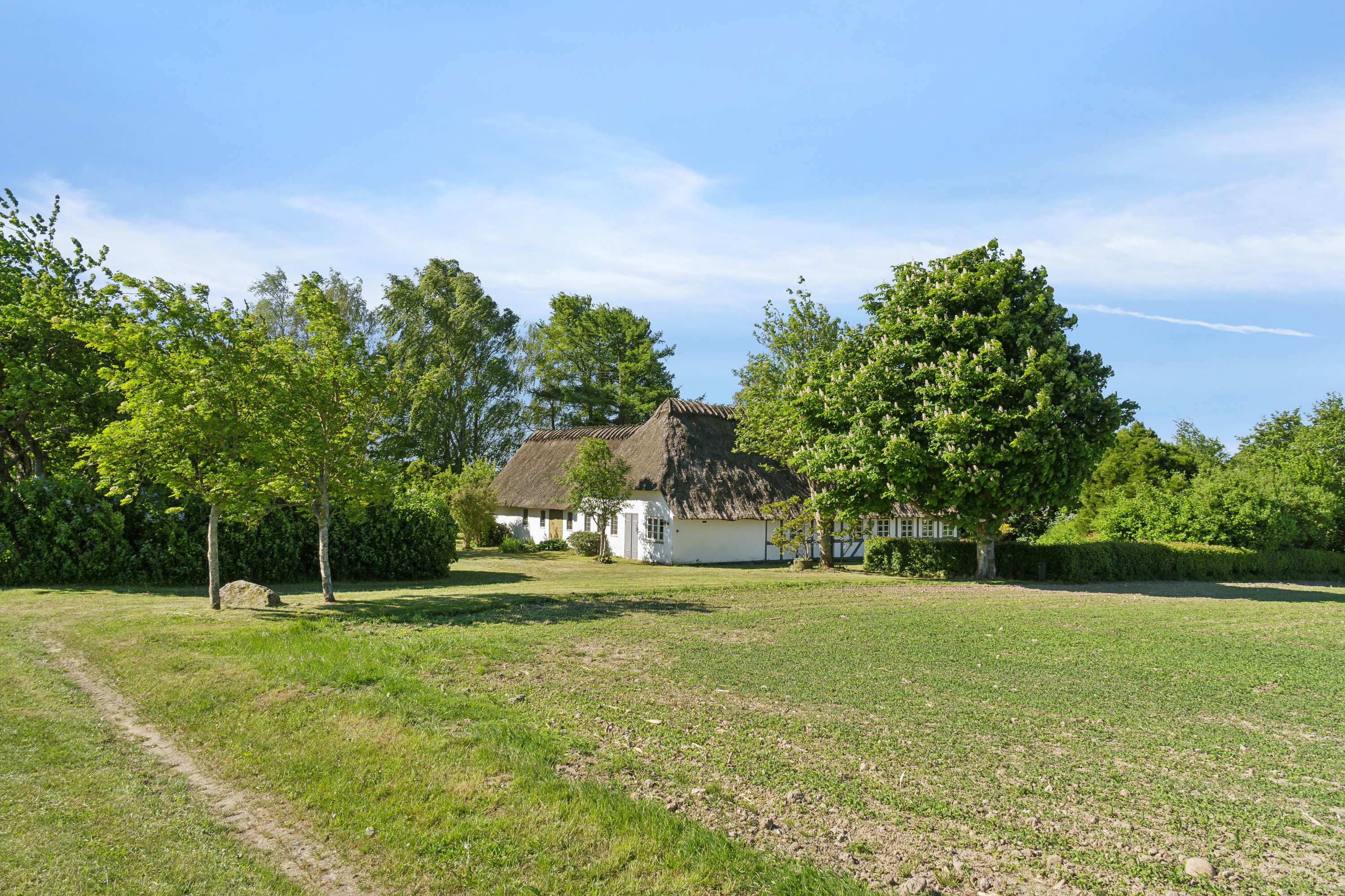 Fremhævet set fra haven billede i fuldskærmstilstand. Billede af Hundstrupvej 79, 5762 Vester Skerninge