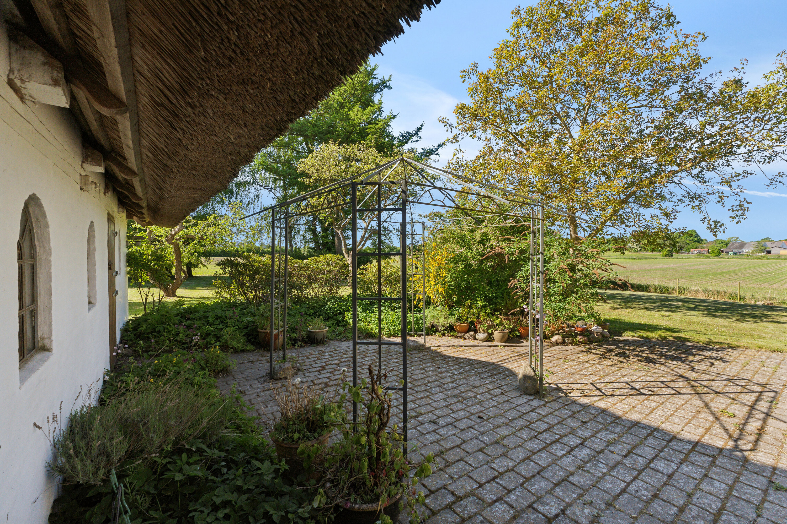 Fremhævet set fra haven billede i fuldskærmstilstand. Billede af Hundstrupvej 79, 5762 Vester Skerninge