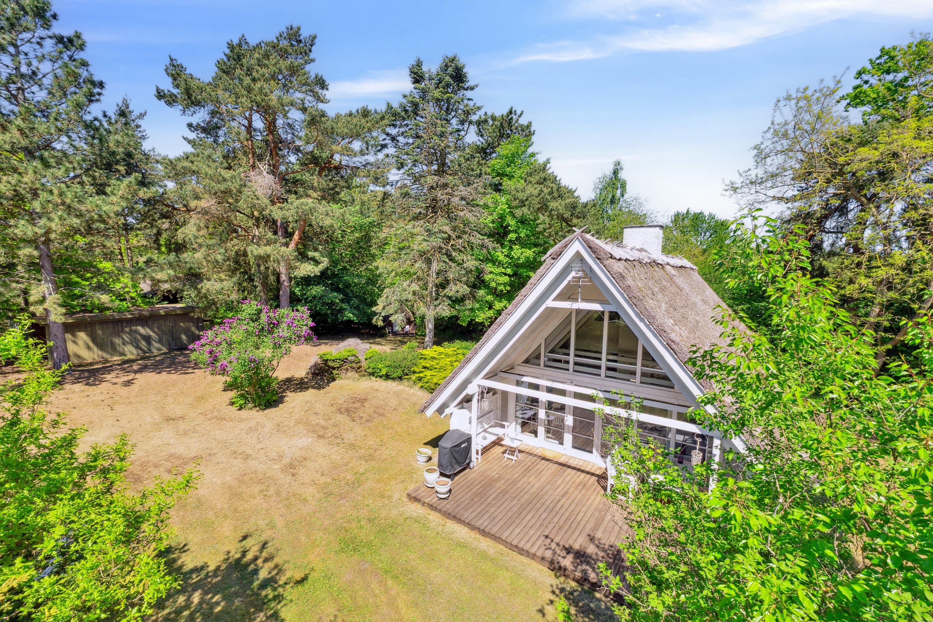 Fremhævet set fra haven billede i fuldskærmstilstand. Billede af Fyrrevangen 8, Asserbo, 3300 Frederiksværk