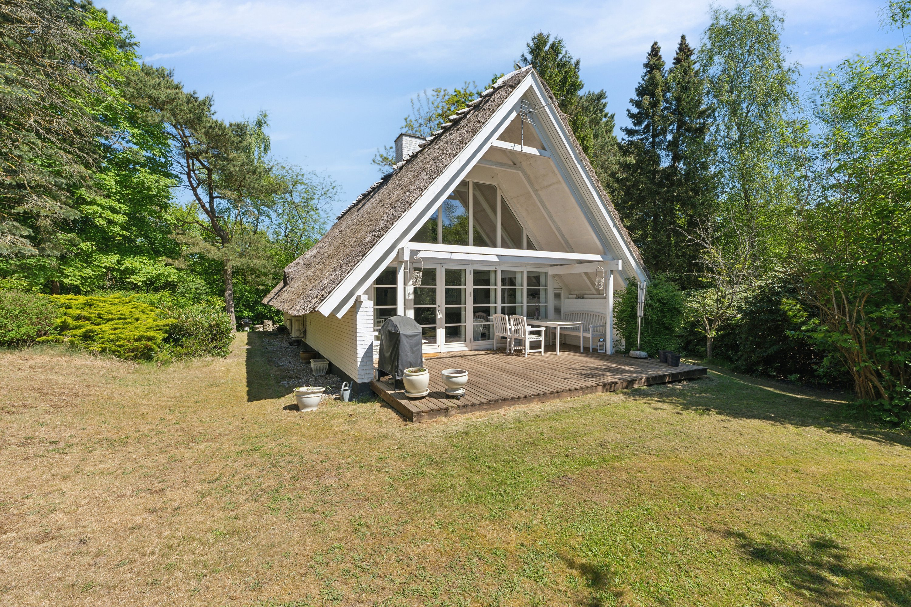 Fremhævet set fra haven billede i fuldskærmstilstand. Billede af Fyrrevangen 8, Asserbo, 3300 Frederiksværk