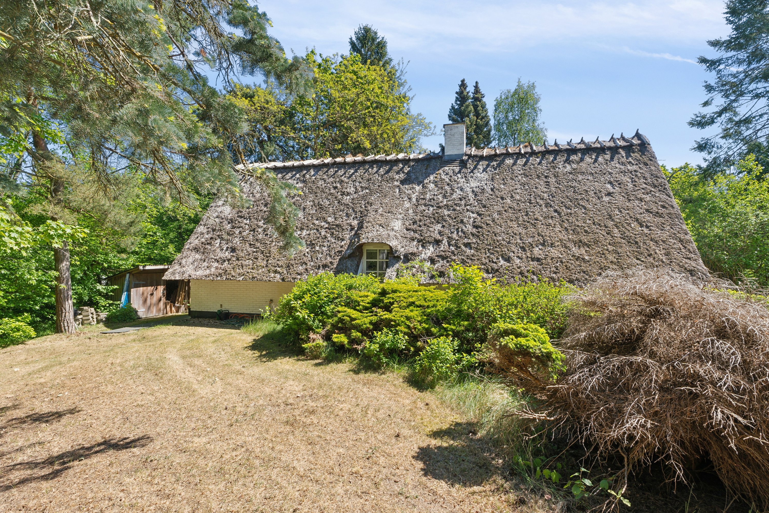 Fremhævet set fra haven billede i fuldskærmstilstand. Billede af Fyrrevangen 8, Asserbo, 3300 Frederiksværk