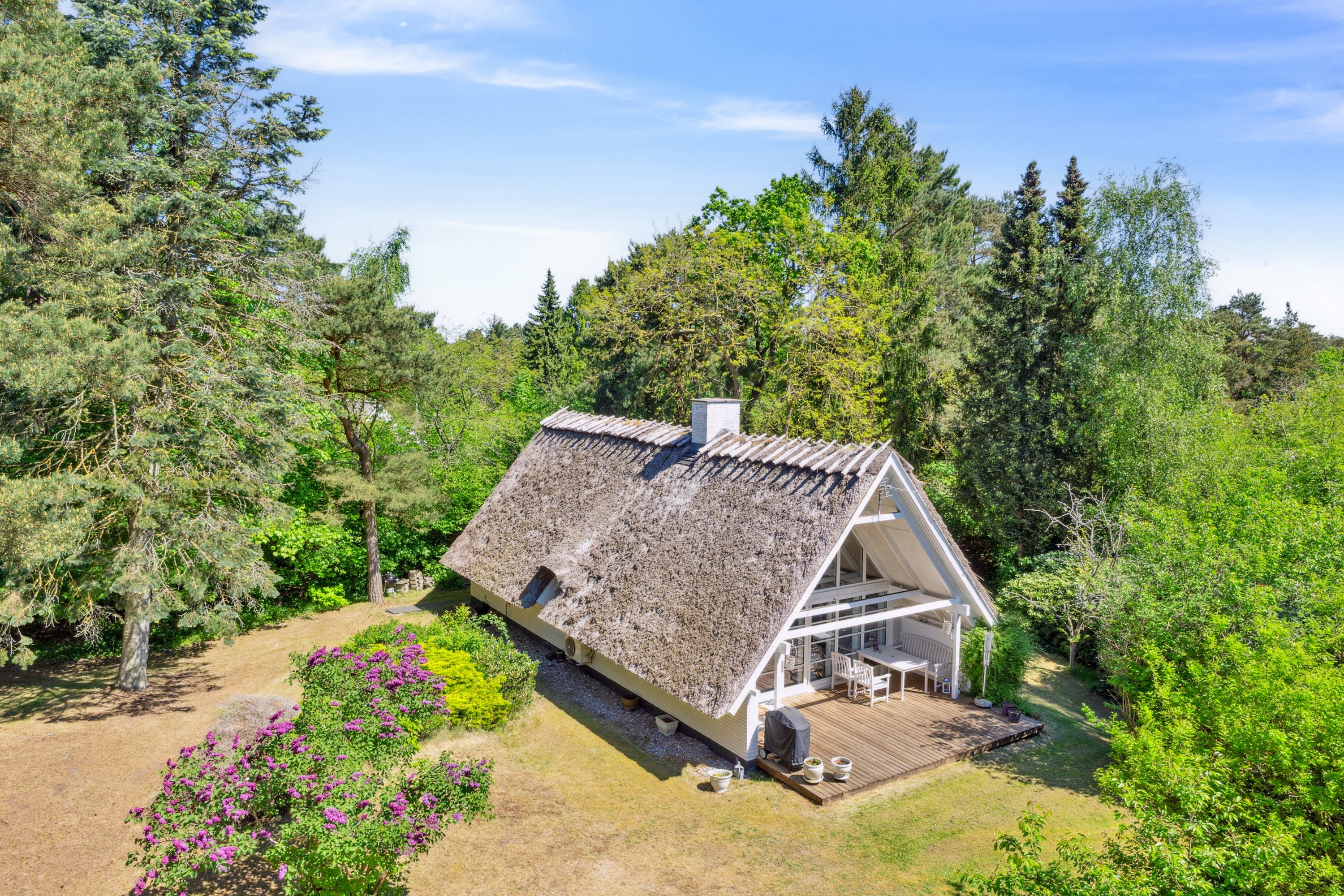 Fremhævet set fra haven billede i fuldskærmstilstand. Billede af Fyrrevangen 8, Asserbo, 3300 Frederiksværk