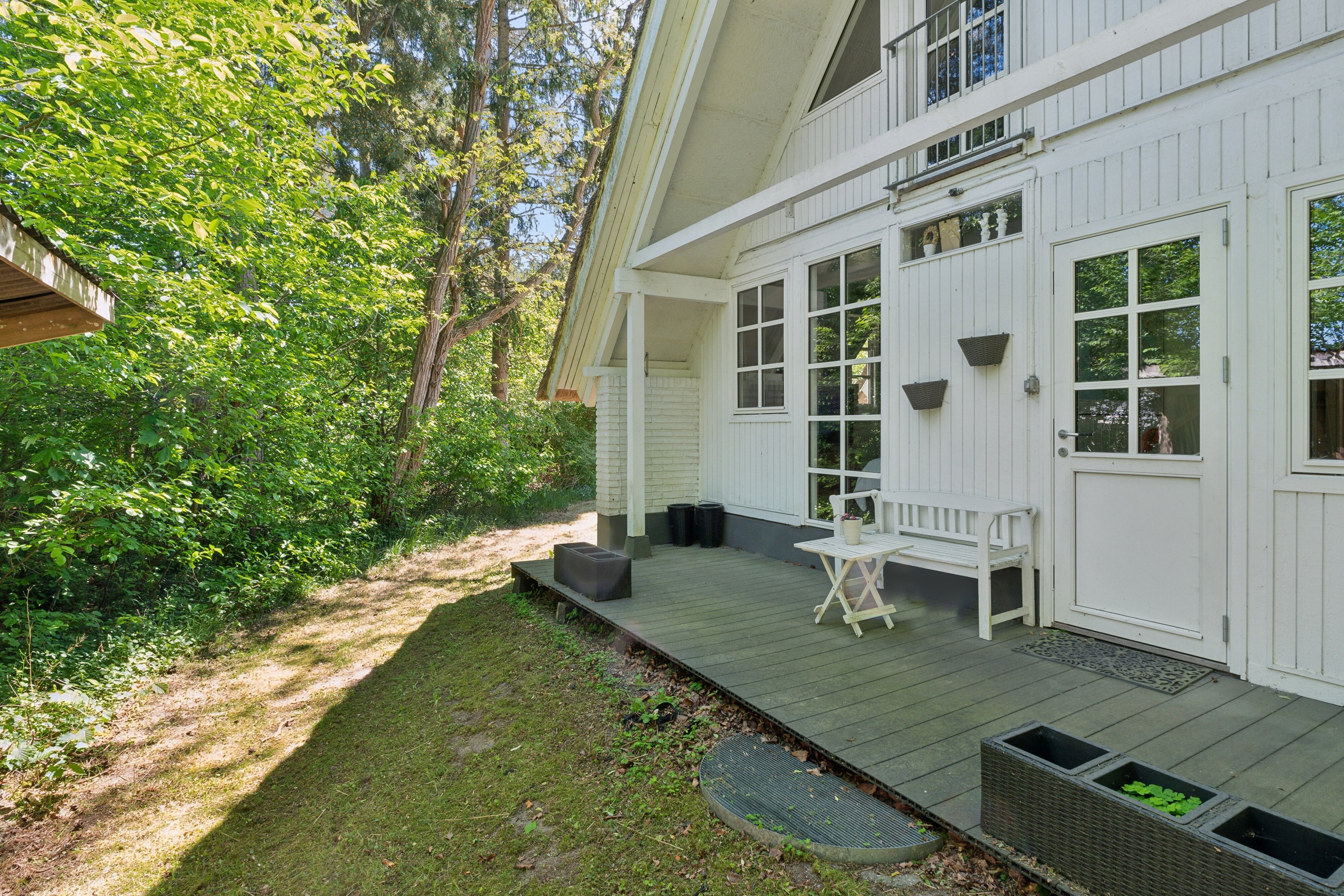 Fremhævet set fra haven billede i fuldskærmstilstand. Billede af Fyrrevangen 8, Asserbo, 3300 Frederiksværk