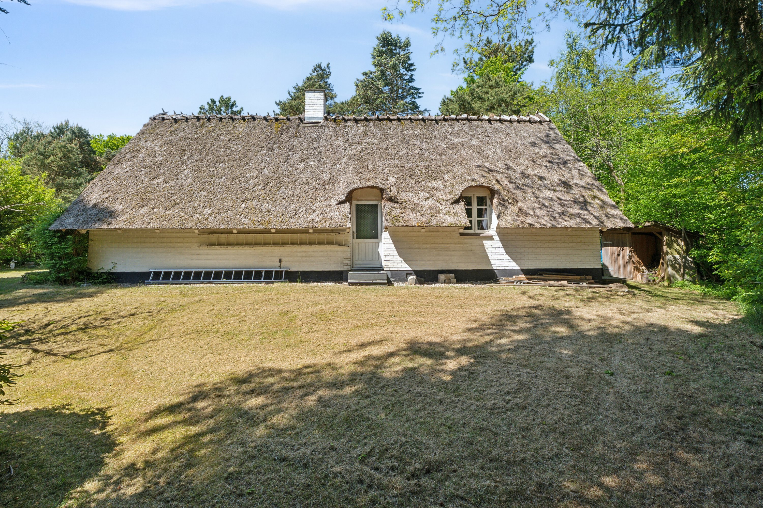 Fremhævet set fra haven billede i fuldskærmstilstand. Billede af Fyrrevangen 8, Asserbo, 3300 Frederiksværk