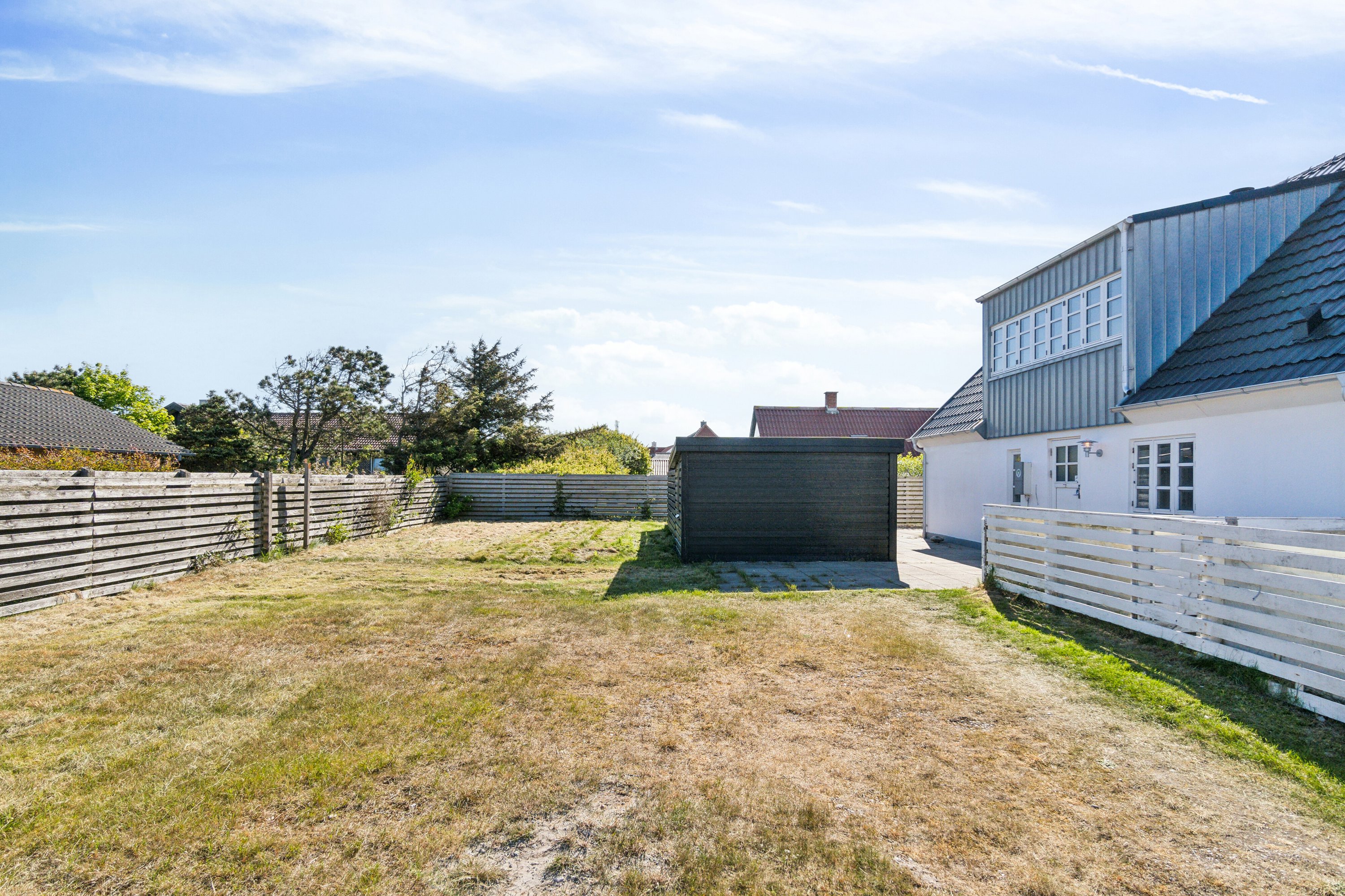 Fremhævet set fra haven billede i fuldskærmstilstand. Billede af Ørhagevej 30, Klitmøller, 7700 Thisted