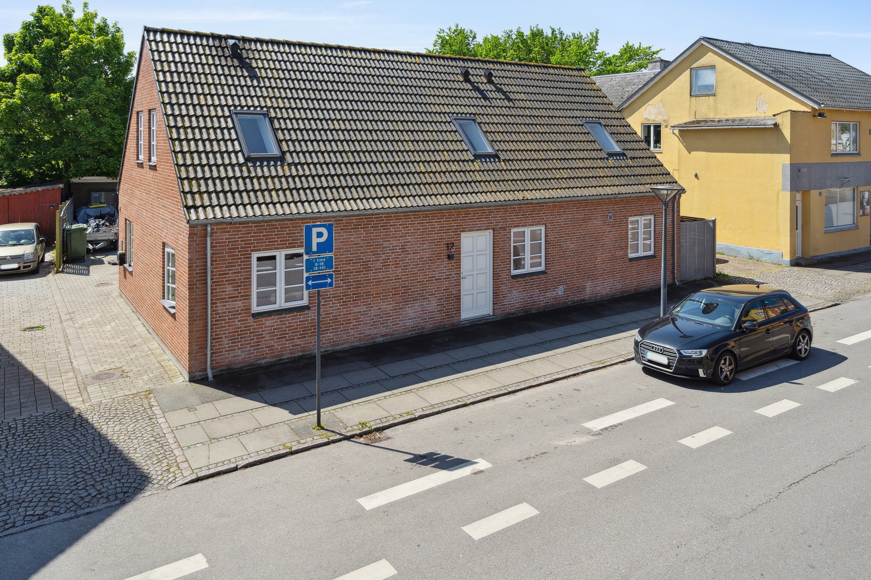 Fremhævet udendørs billede i fuldskærmstilstand. Billede af Bredgade 12, 4653 Karise