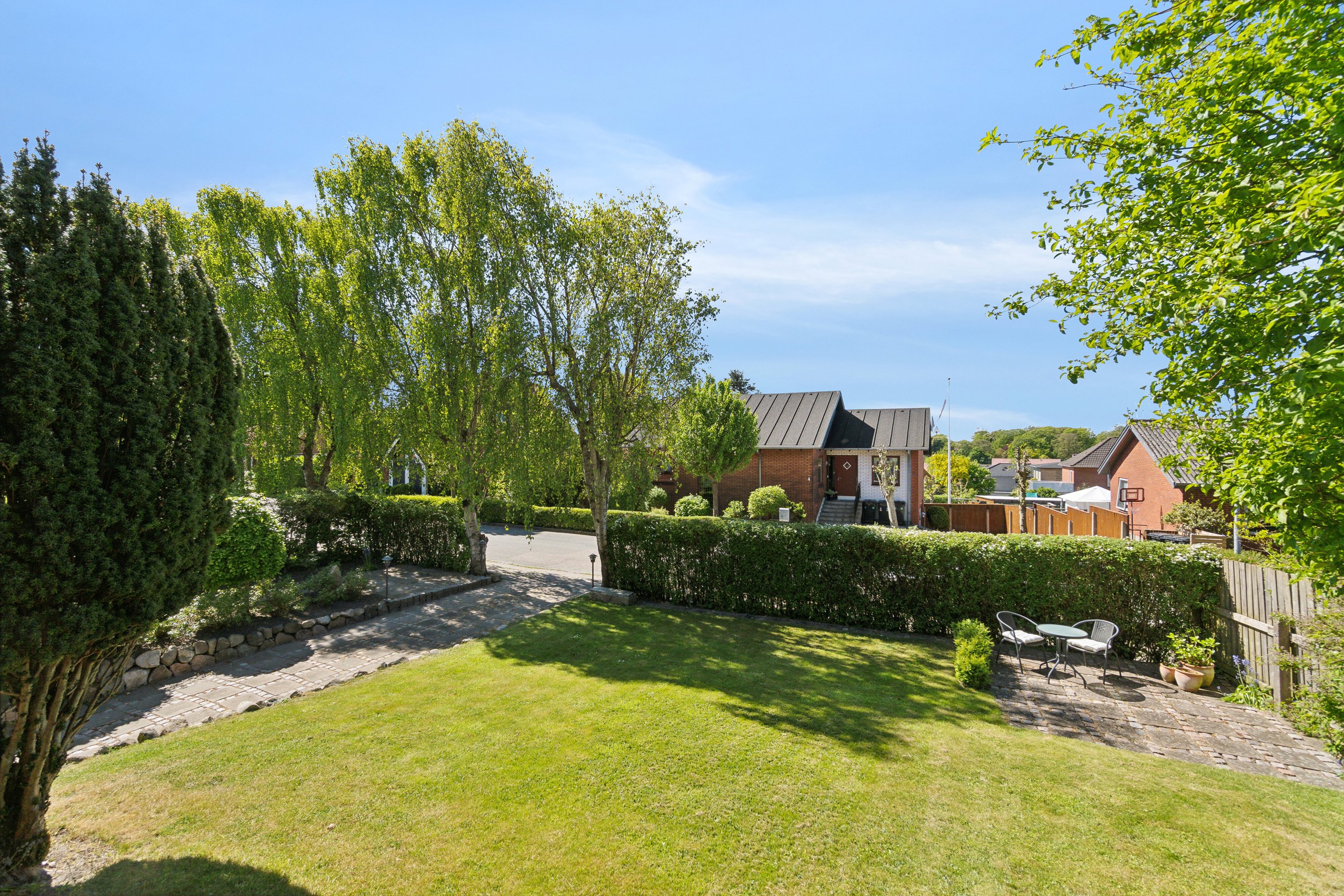 Fremhævet set fra haven billede i fuldskærmstilstand. Billede af Byvangen 3, 7700 Thisted