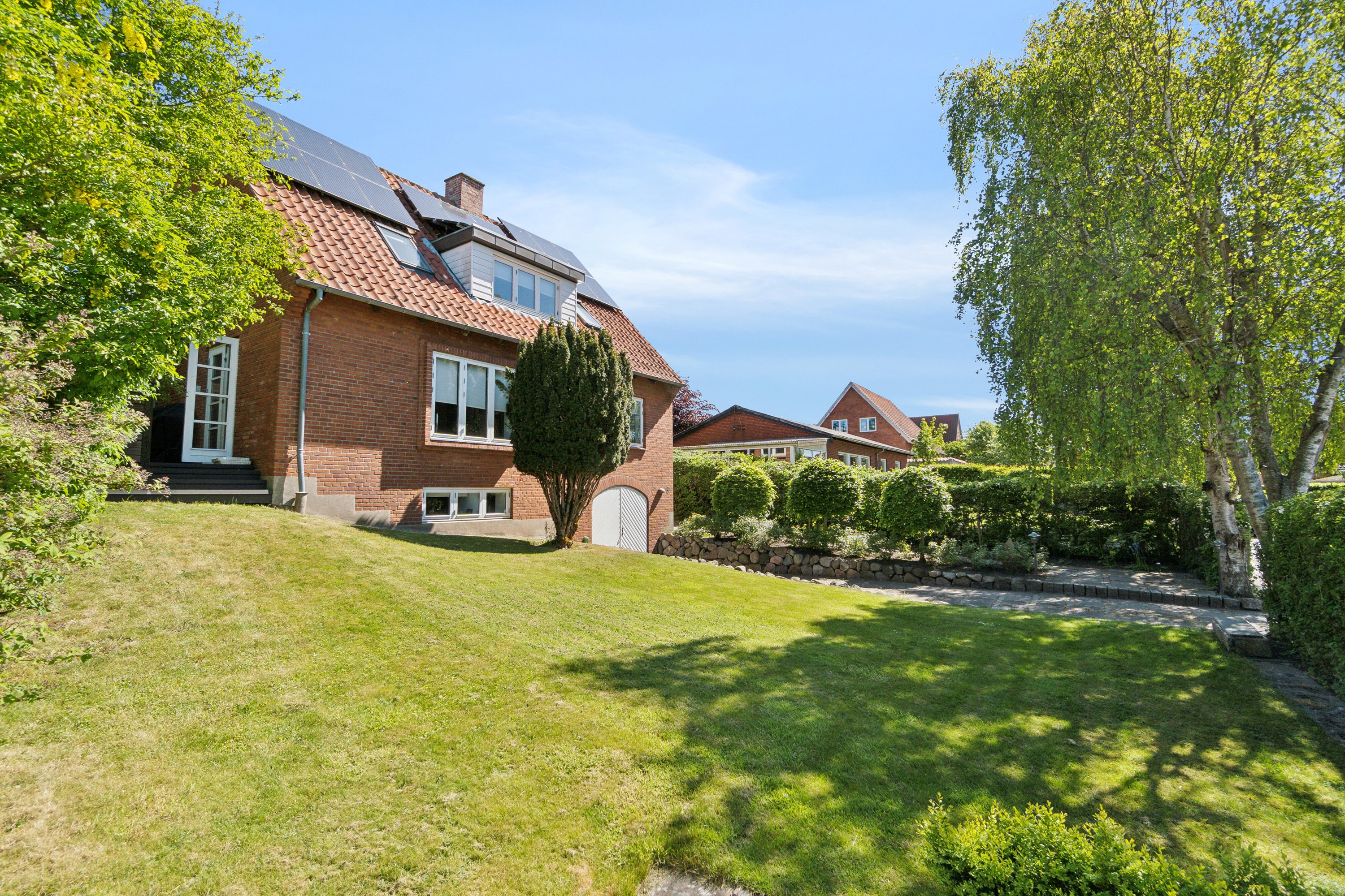 Fremhævet set fra haven billede i fuldskærmstilstand. Billede af Byvangen 3, 7700 Thisted