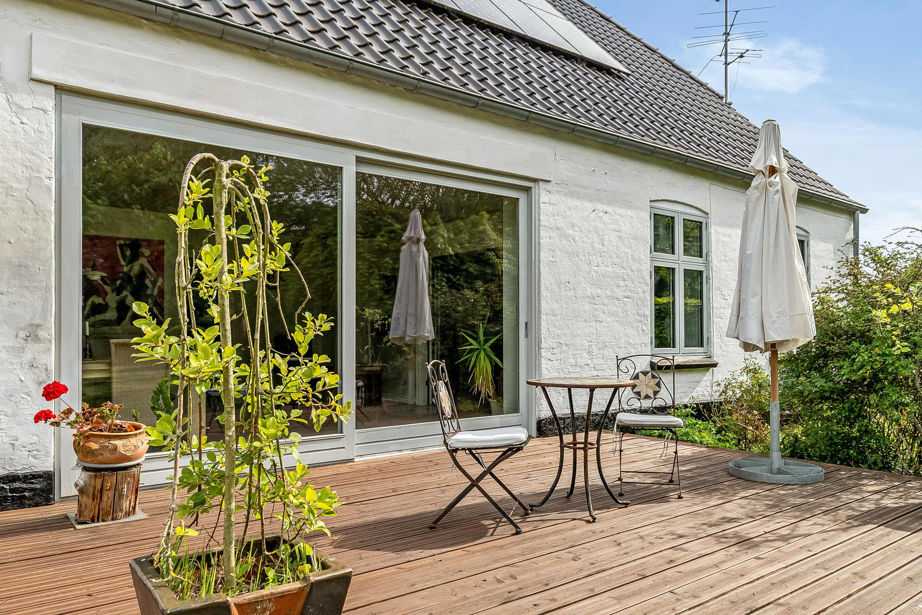 Fremhævet terrasse billede i fuldskærmstilstand. Billede af Holbækgårdvej 2, Revsø, 6070 Christiansfeld