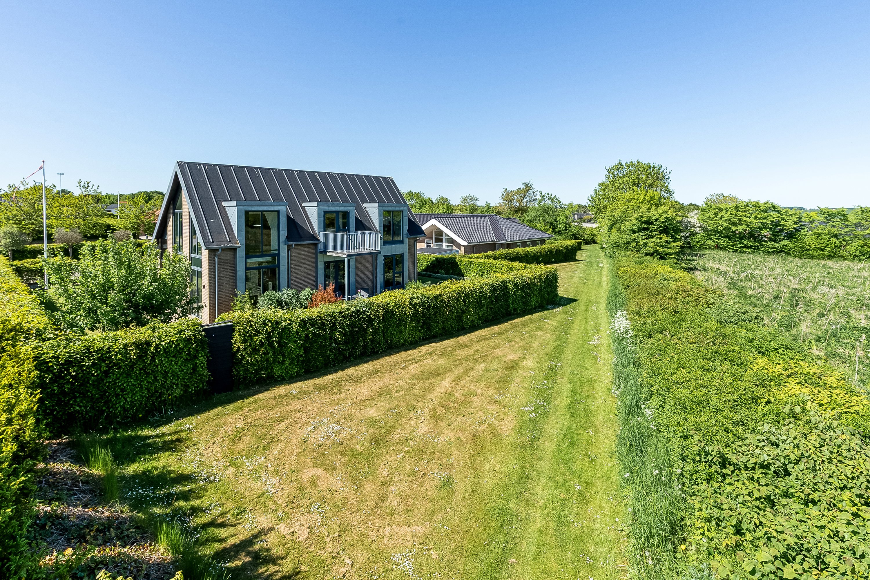 Fremhævet mastefoto billede i fuldskærmstilstand. Billede af Goldbæk Alle 23, Dalby, 6000 Kolding