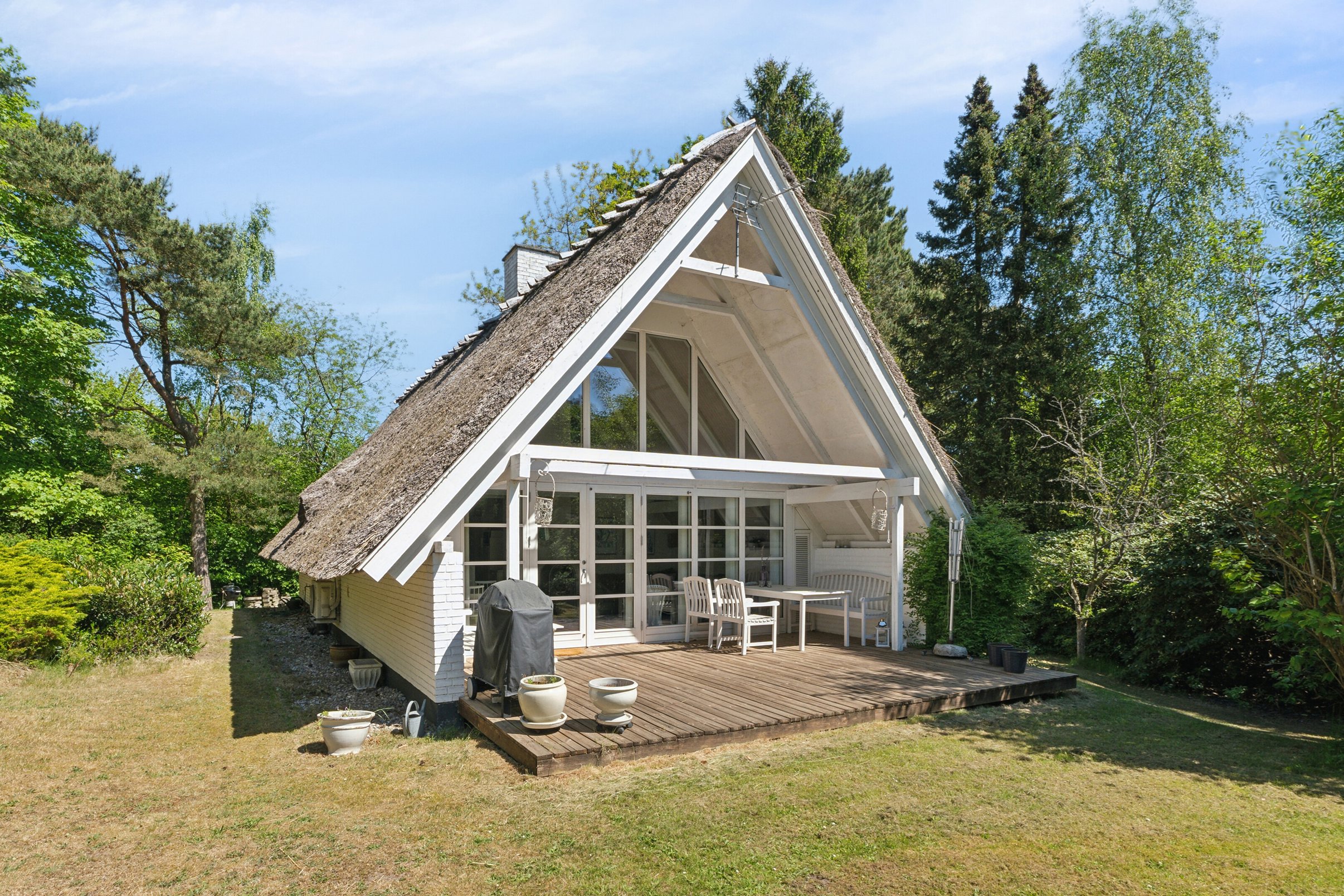 Fremhævet set fra haven billede i fuldskærmstilstand. Billede af Fyrrevangen 8, Asserbo, 3300 Frederiksværk