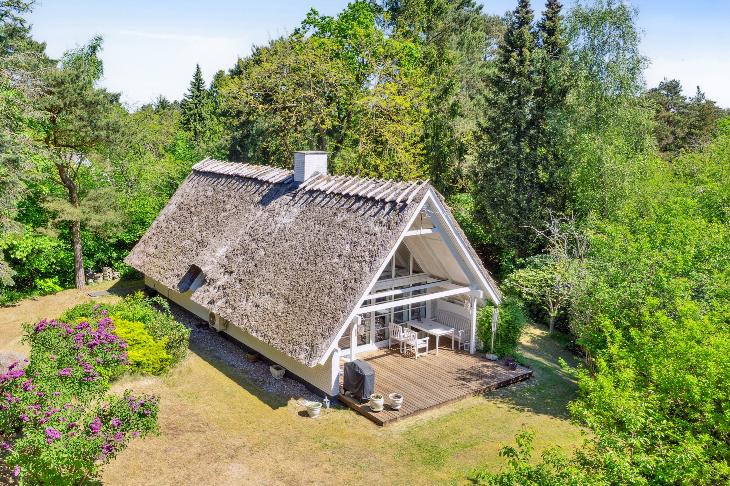 Fremhævet set fra haven billede i fuldskærmstilstand. Billede af Fyrrevangen 8, Asserbo, 3300 Frederiksværk