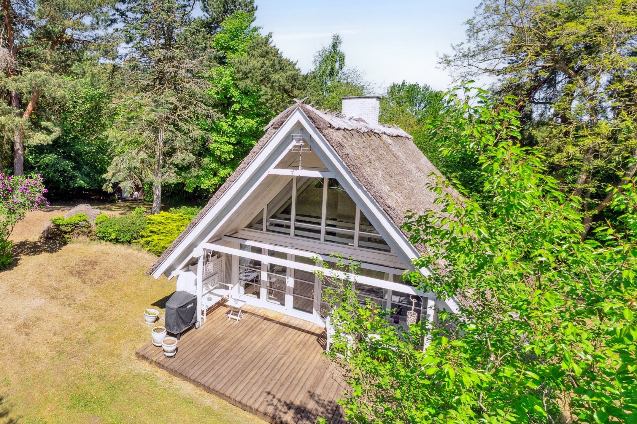 Fremhævet set fra haven billede i fuldskærmstilstand. Billede af Fyrrevangen 8, Asserbo, 3300 Frederiksværk