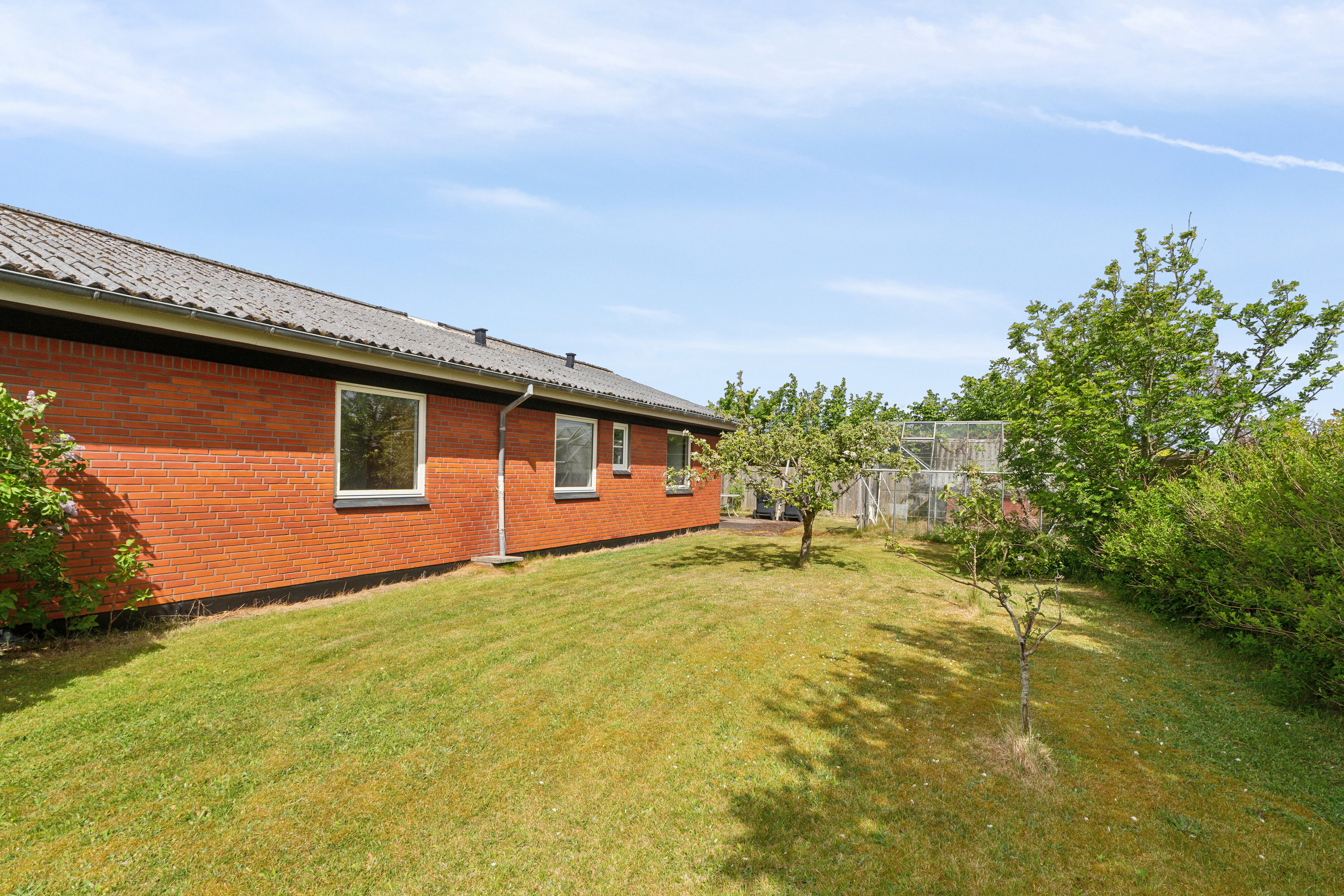 Fremhævet set fra haven billede i fuldskærmstilstand. Billede af Tannisbugtvej 70, Tversted, 9881 Bindslev