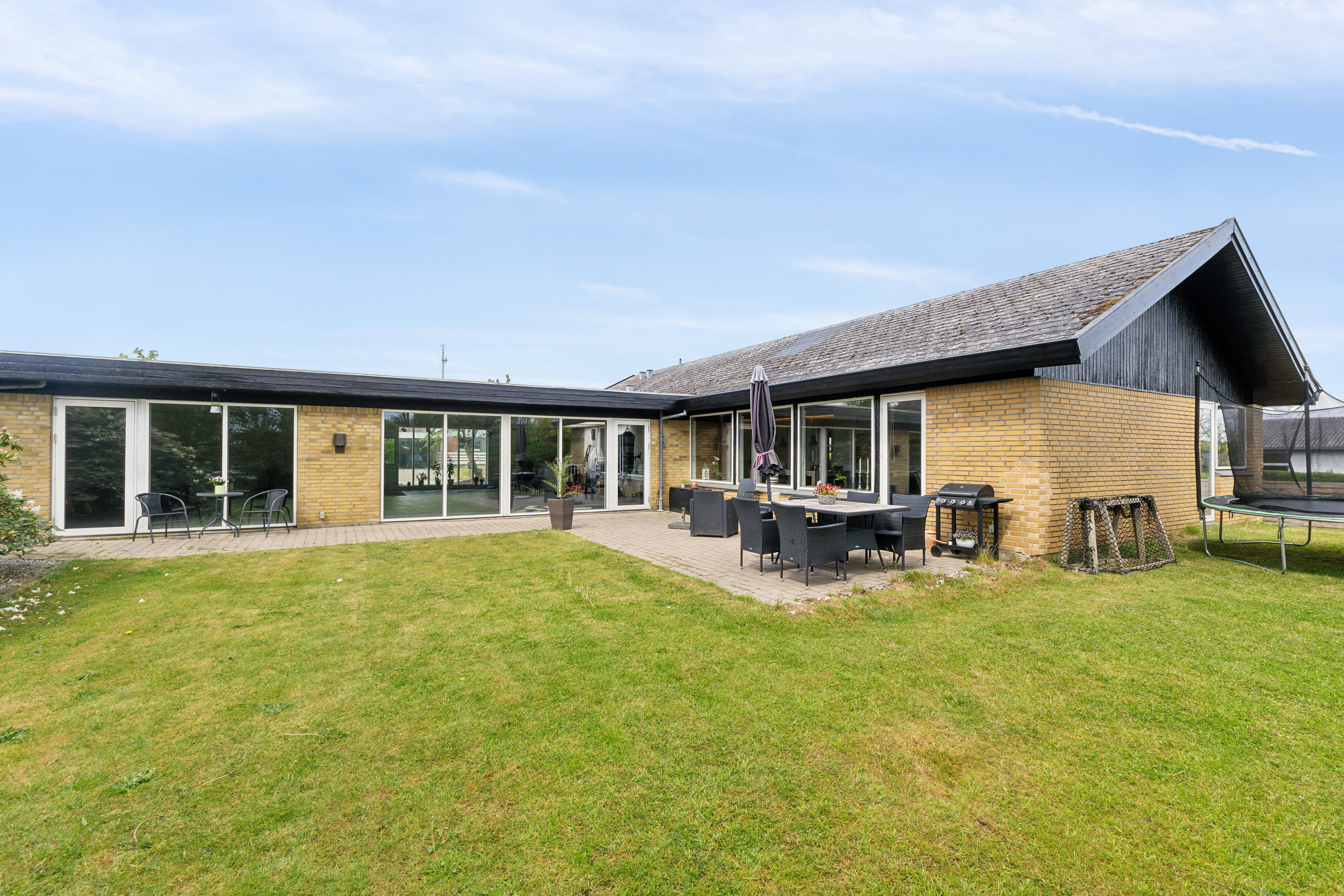 Fremhævet set fra haven billede i fuldskærmstilstand. Billede af Frejasvej 9, 9870 Sindal