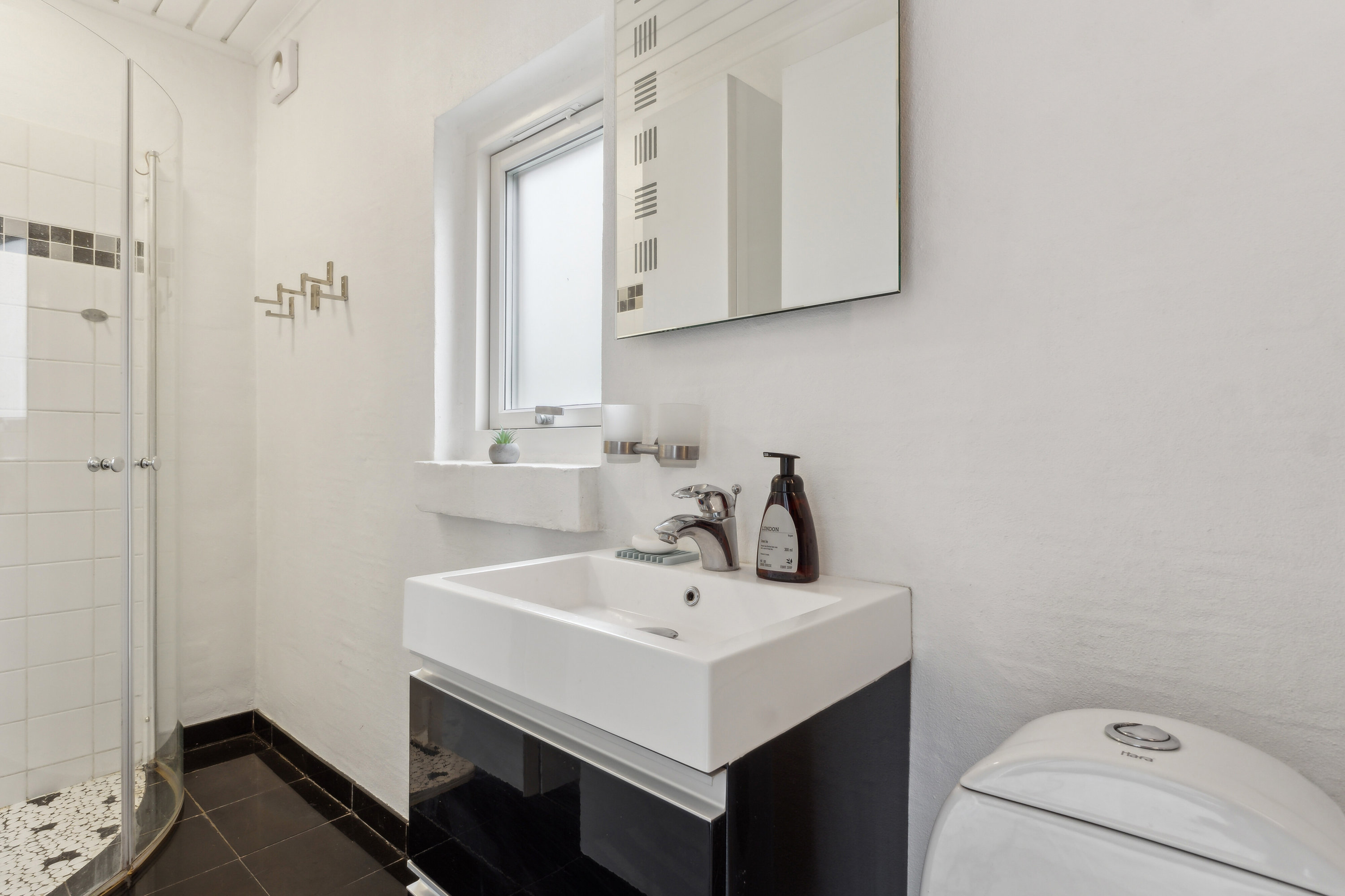 Fremhævet badeværelse billede i fuldskærmstilstand. Billede af Mølmarksvej 178, 5700 Svendborg