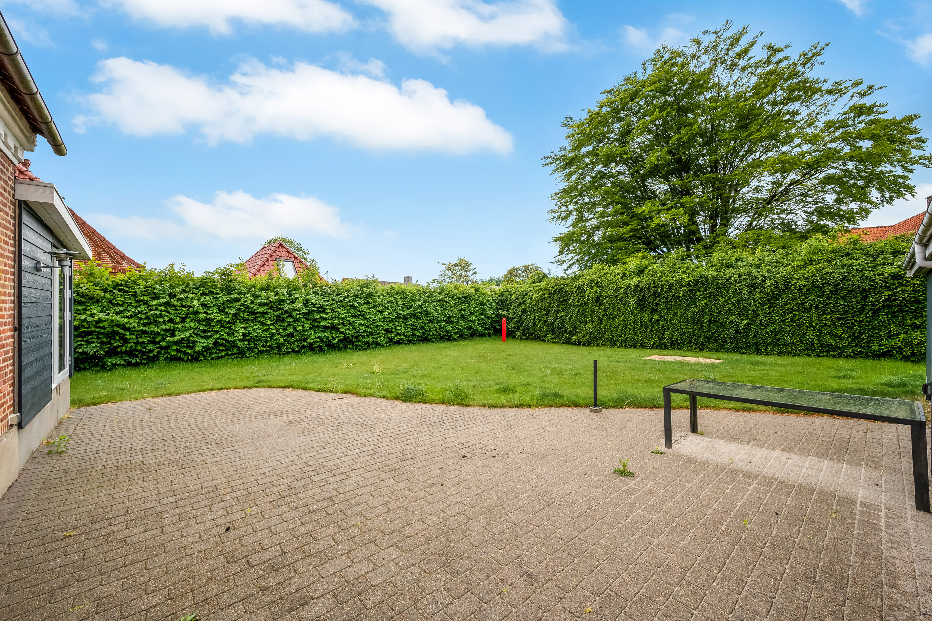 Fremhævet have  billede i fuldskærmstilstand. Billede af Hovedgaden 27, 6971 Spjald