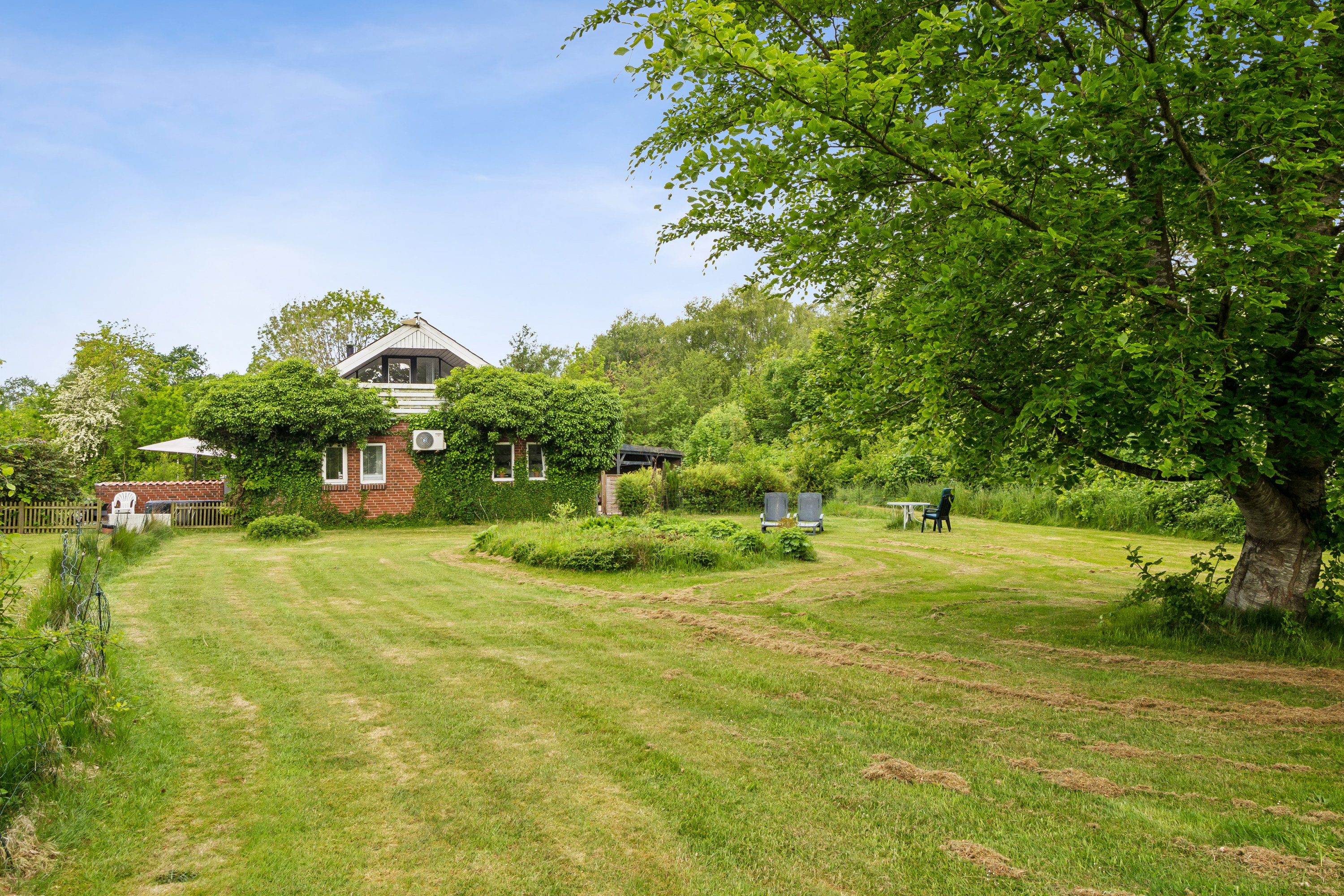 Fremhævet have billede i fuldskærmstilstand. Billede af Astrup Vig 92, Astrup Vig, 7870 Roslev