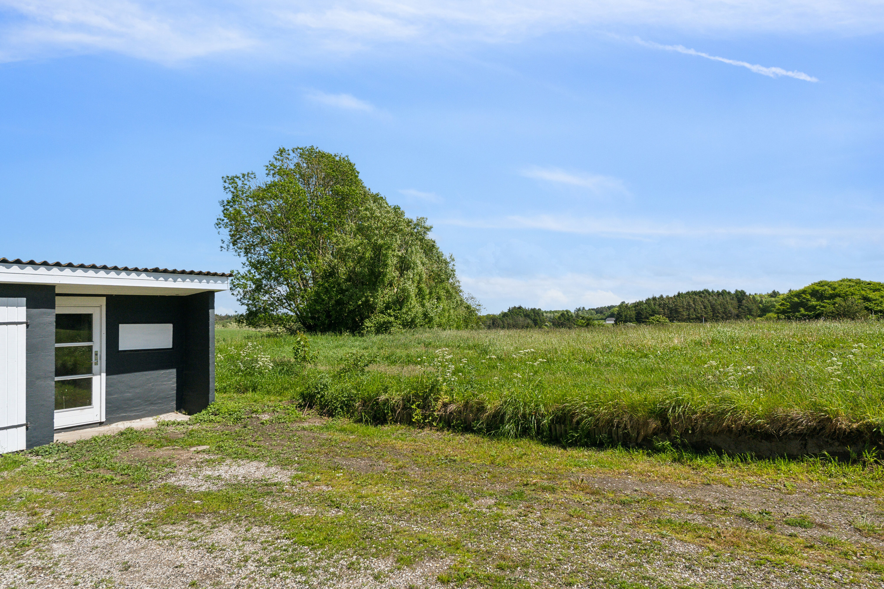 Fremhævet set fra haven billede i fuldskærmstilstand. Billede af Skagen Landevej 332, Bjergby, 9800 Hjørring
