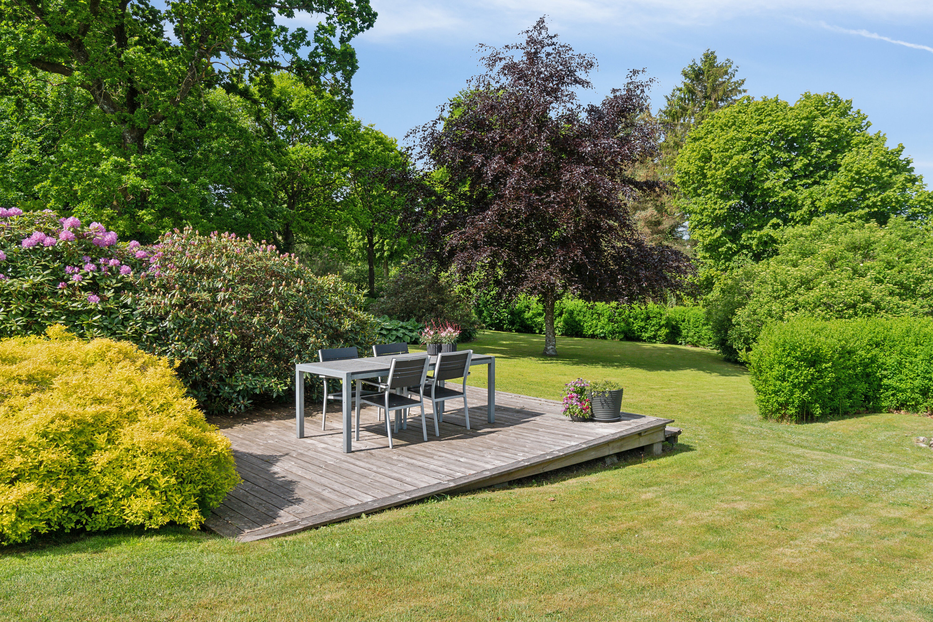 Fremhævet set fra haven billede i fuldskærmstilstand. Billede af Skovvej 19, Thorning, 8620 Kjellerup