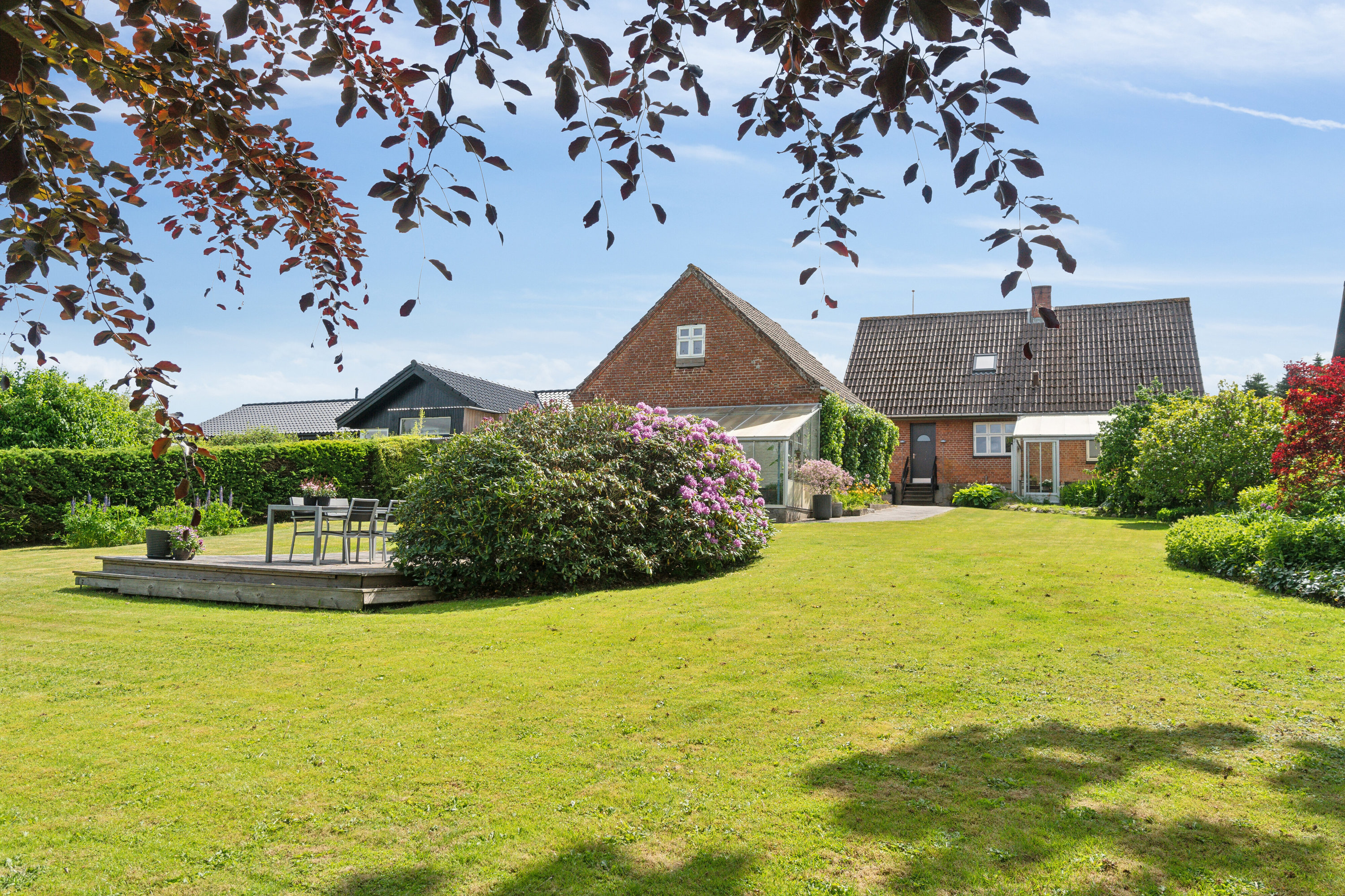 Fremhævet set fra haven billede i fuldskærmstilstand. Billede af Skovvej 19, Thorning, 8620 Kjellerup