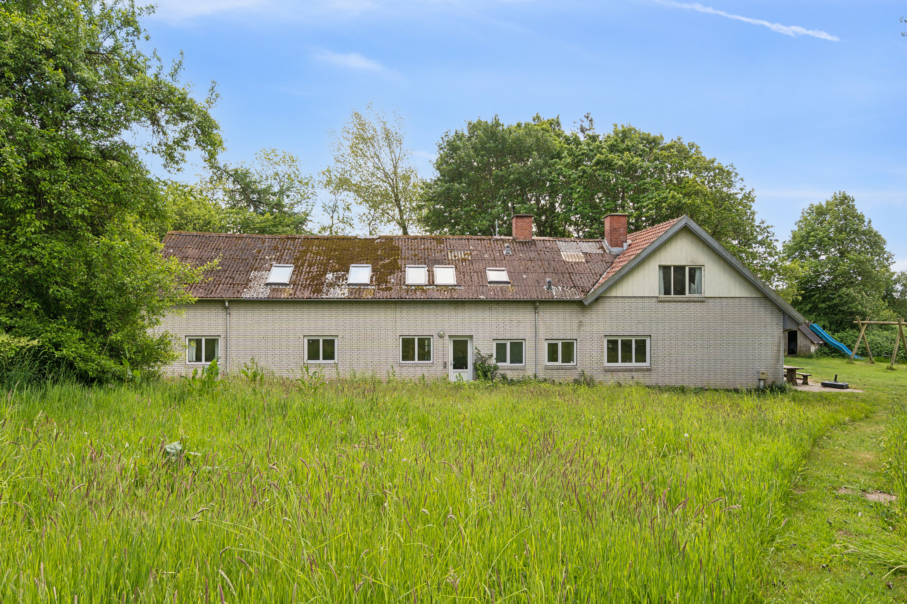 Fremhævet set fra haven billede i fuldskærmstilstand. Billede af Varnæshoved 4, Varnæs, 6200 Aabenraa