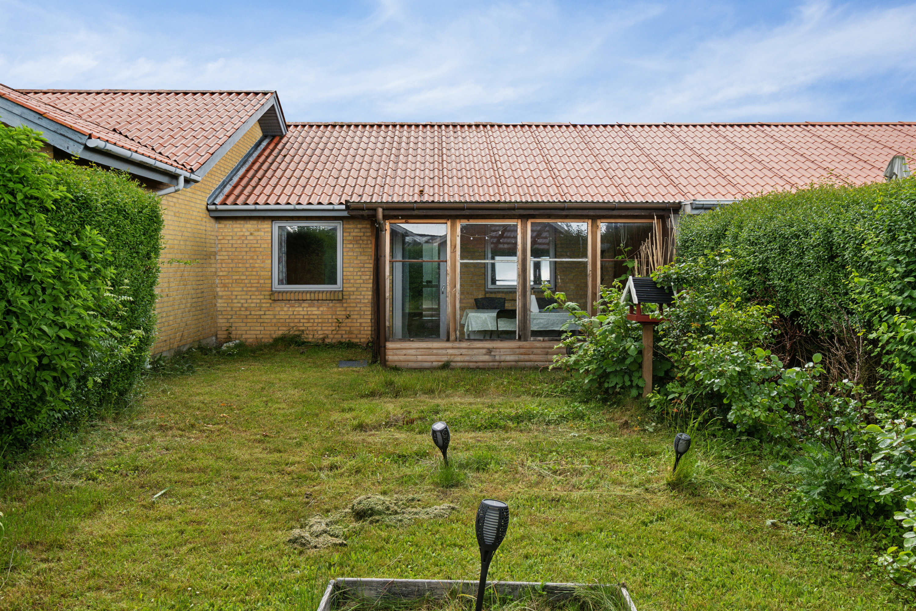 Fremhævet set fra haven billede i fuldskærmstilstand. Billede af Lærkevej 3, 4261 Dalmose